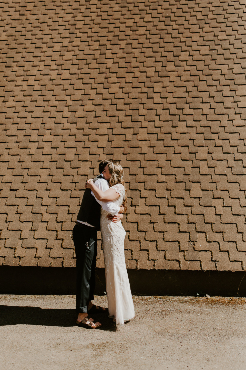 Dan and Hannah hug in Corvallis, Oregon. Intimate wedding photography in Corvallis Oregon by Sienna Plus Josh.
