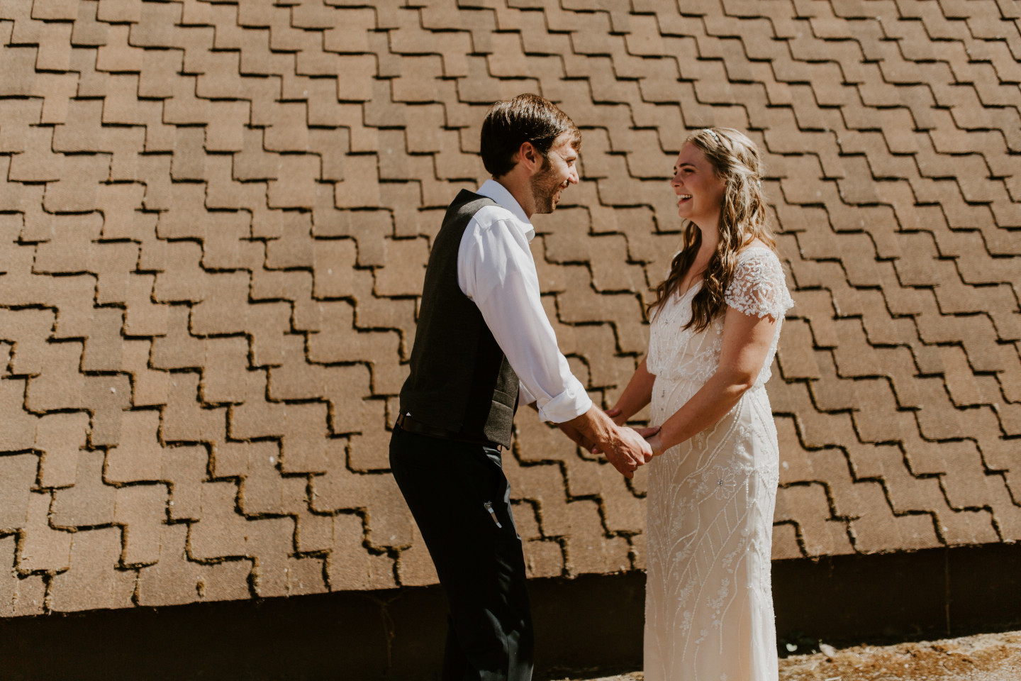 Hannah and Dan hold hands in Corvallis, Oregon. Intimate wedding photography in Corvallis Oregon by Sienna Plus Josh.