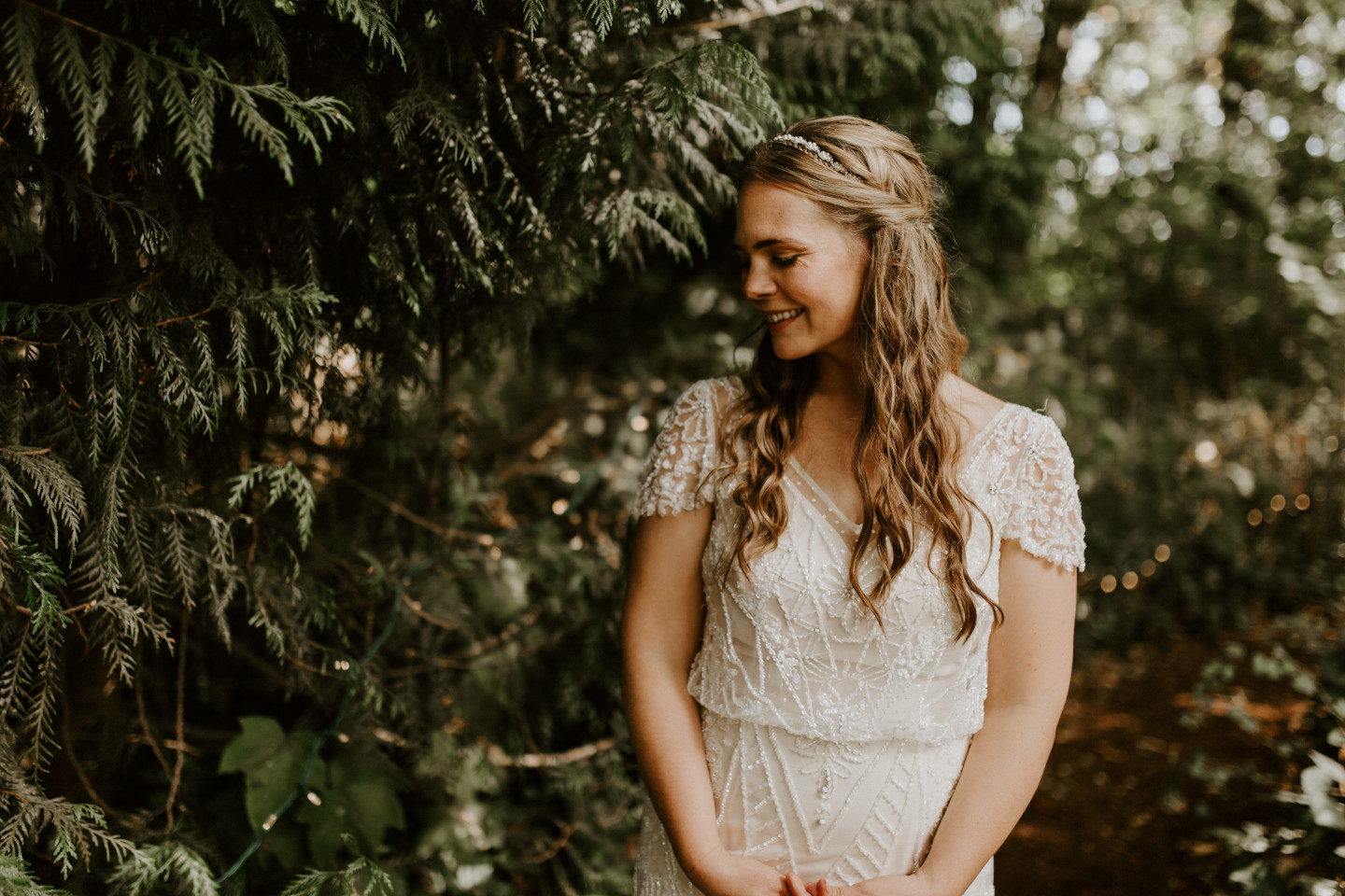 Hannah stands in the woods in Corvallis, Oregon. Intimate wedding photography in Corvallis Oregon by Sienna Plus Josh.