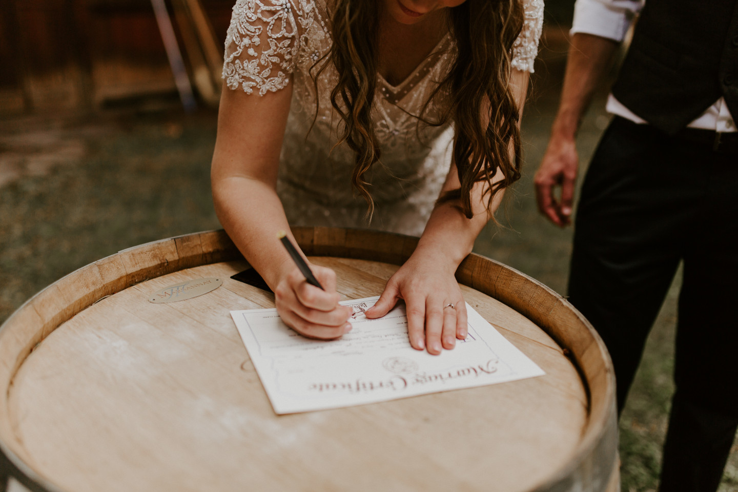 Hannah and Dan sign their marriage certificate in Corvallis, Oregon. Intimate wedding photography in Corvallis Oregon by Sienna Plus Josh.