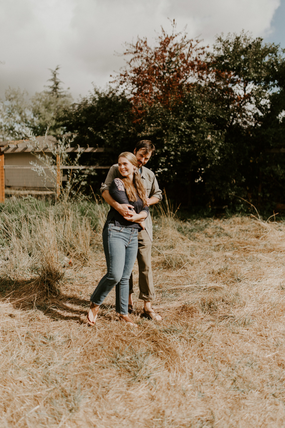 Dan holds Hannah in Corvallis, Oregon. Intimate wedding photography in Corvallis Oregon by Sienna Plus Josh.