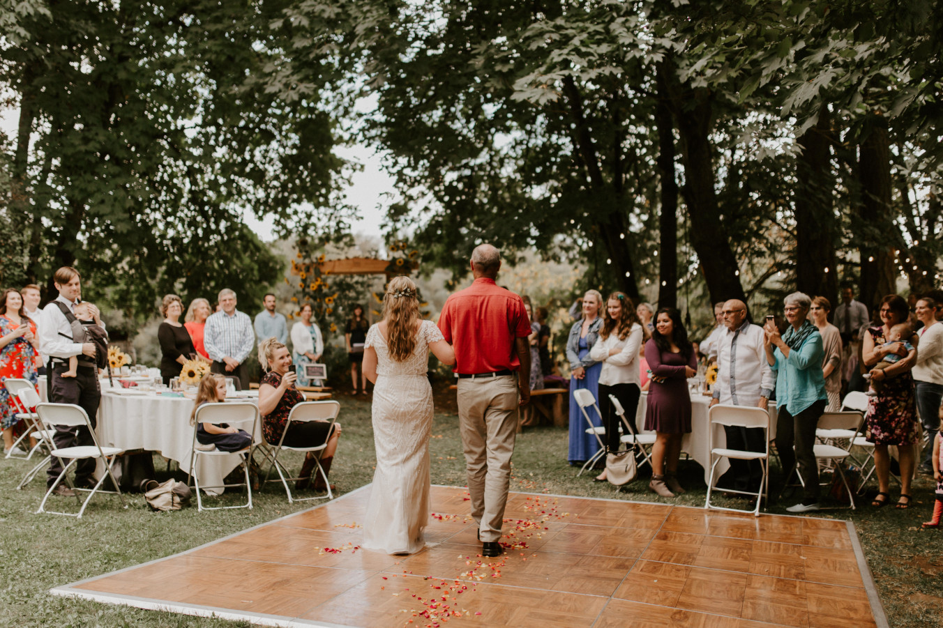 Hannah's father walks her down the aisle in Corvallis, Oregon. Intimate wedding photography in Corvallis Oregon by Sienna Plus Josh.