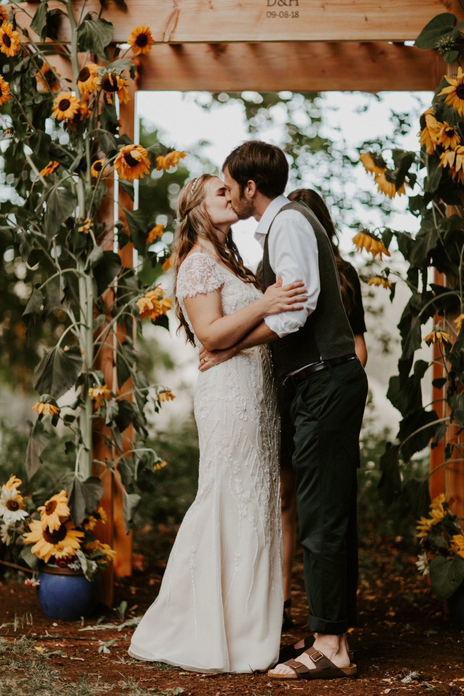 Hannah and Dan kiss at the altar in Corvallis, Oregon. Intimate wedding photography in Corvallis Oregon by Sienna Plus Josh.