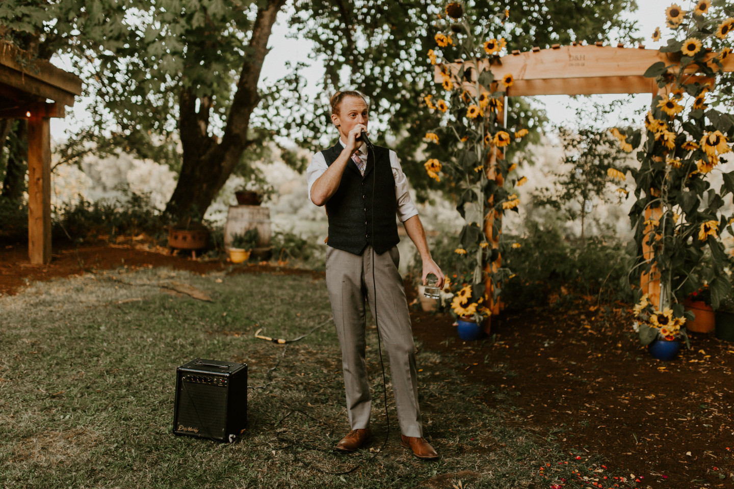 A guest gives a toast in Corvallis, Oregon. Intimate wedding photography in Corvallis Oregon by Sienna Plus Josh.