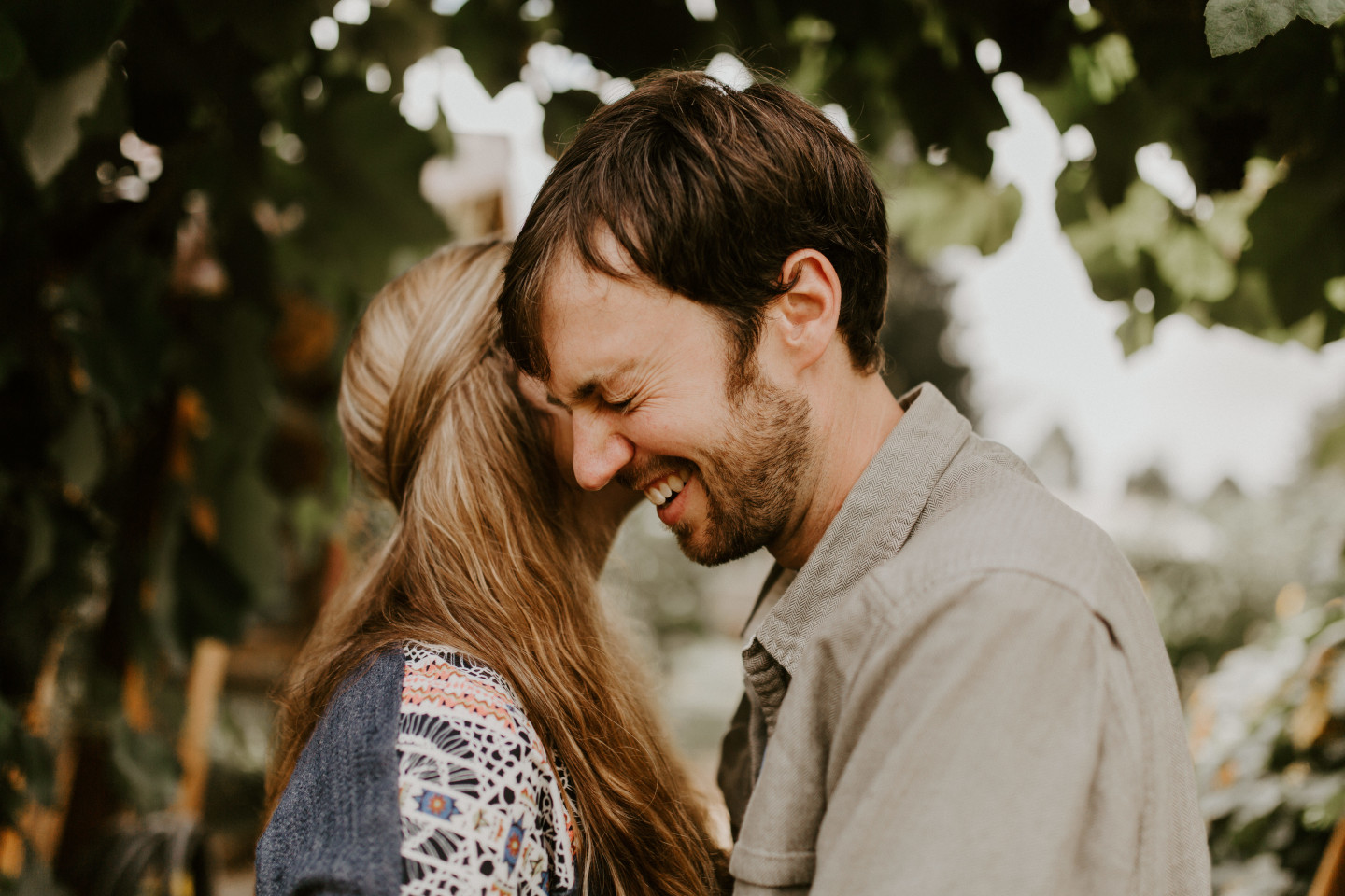 Hannah whispers in Dan's ear in Corvallis, Oregon during their Oregon Adventure. Intimate wedding photography in Corvallis Oregon by Sienna Plus Josh.