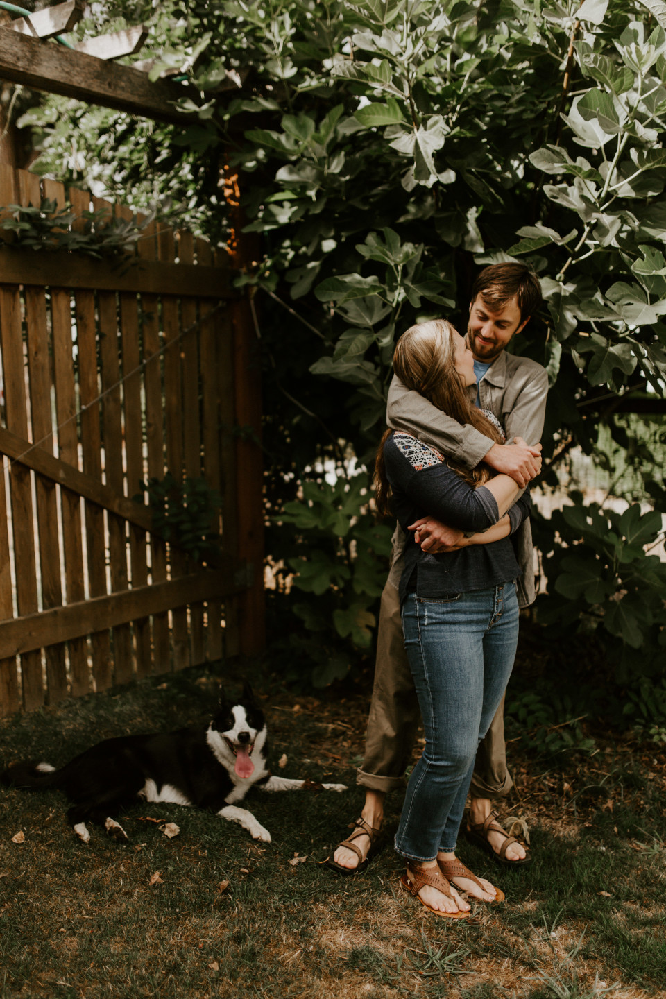 Dan and Hannah's dog sits next to them in Corvallis, Oregon. Intimate wedding photography in Corvallis Oregon by Sienna Plus Josh.