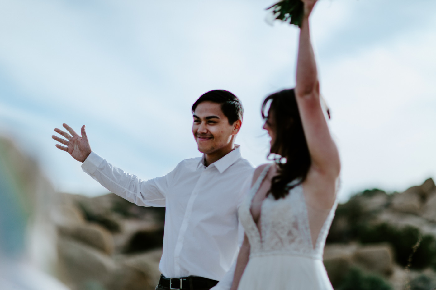 Shelby and Zack celebrate after they elope in Joshua Tree.