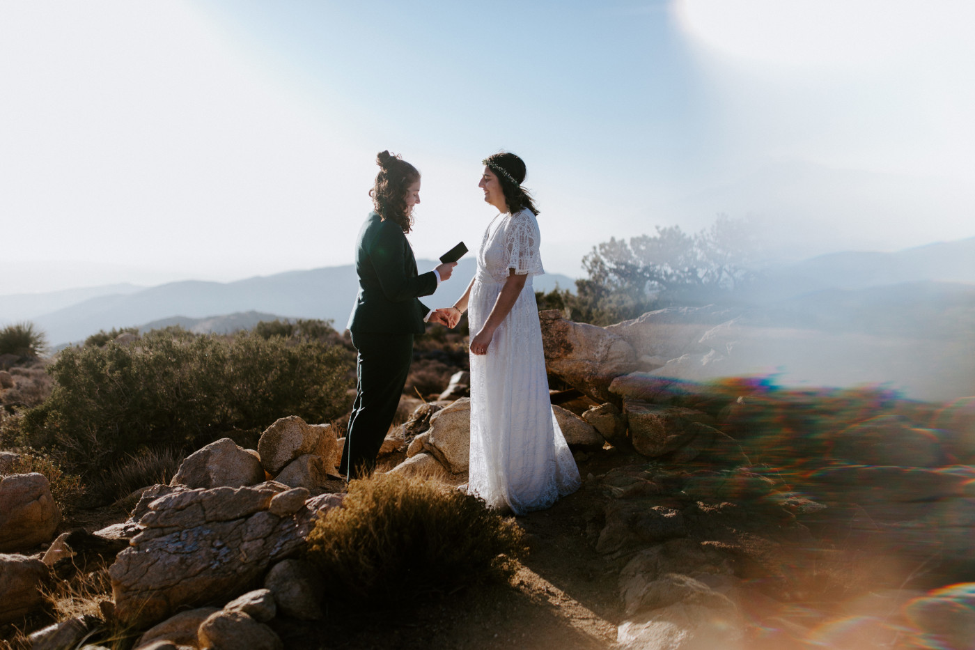 Becca and Madison read their vows to each other during their Joshua Tree National Park elopement.