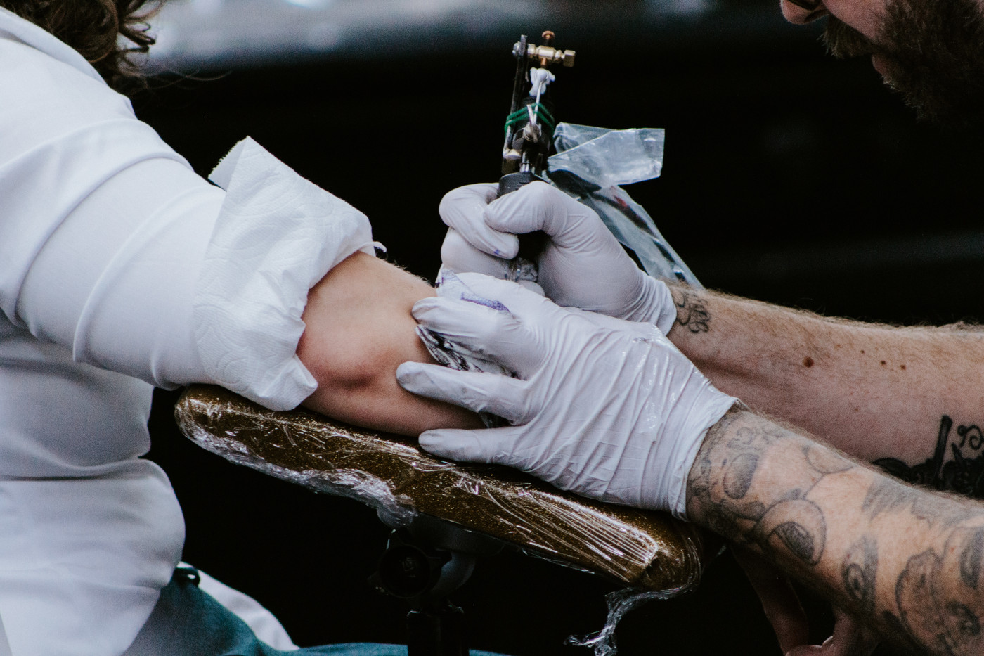 A close up of the tattoo being inked.