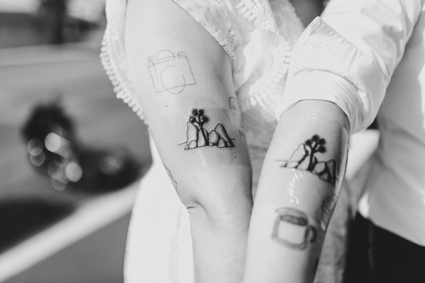 A closeup of the matching tattoos.