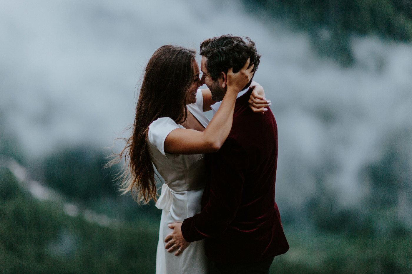 Katelyn and Murray hold each other. Elopement wedding photography at Mount Hood by Sienna Plus Josh.