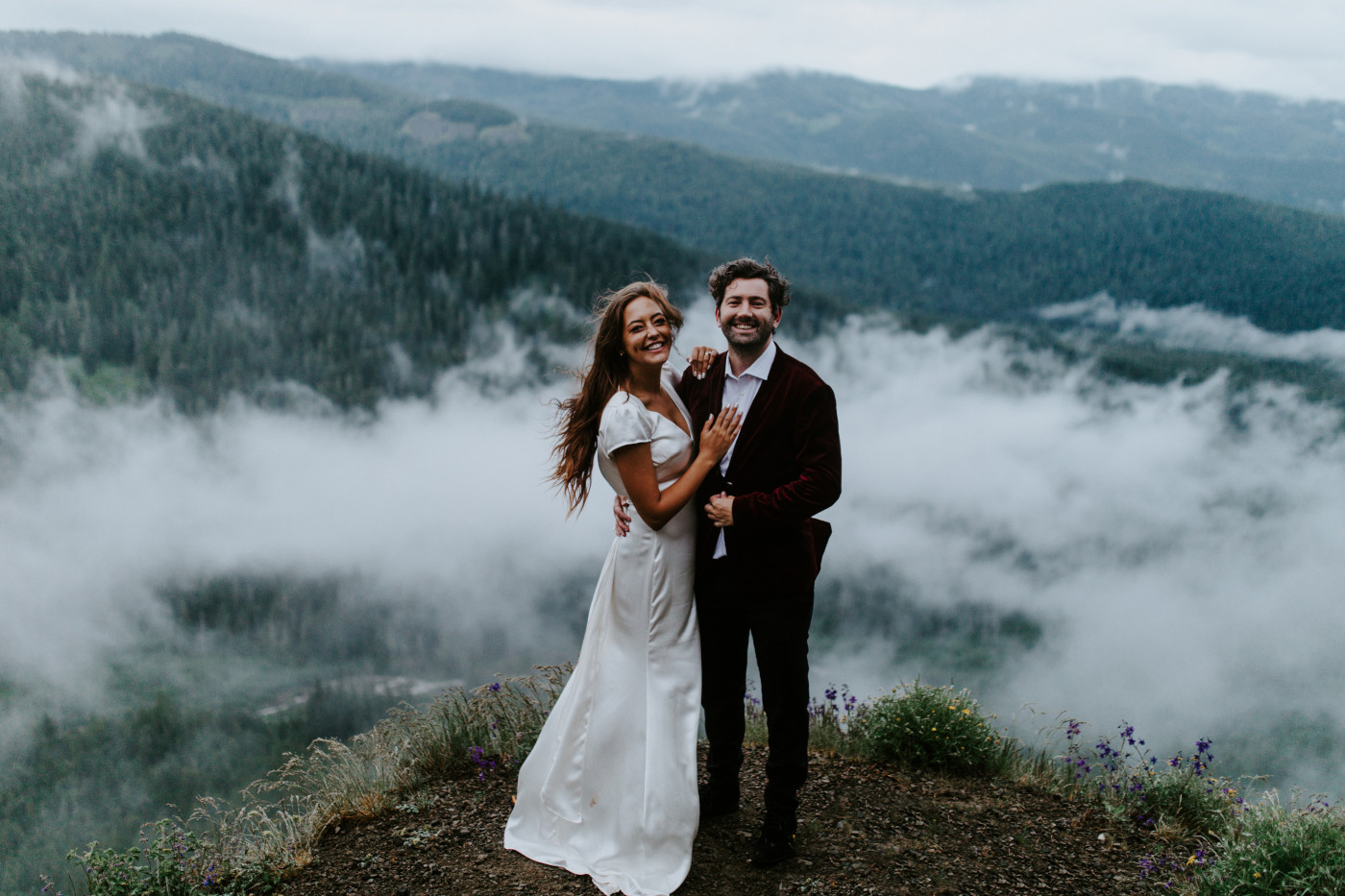 Katelyn and Murray stand with an expansive view of the woods behind them. Elopement wedding photography at Mount Hood by Sienna Plus Josh.