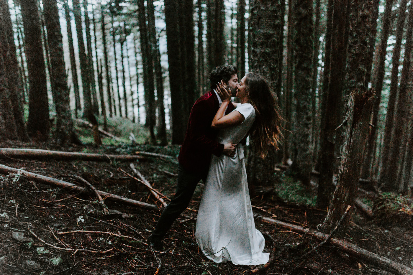 Katelyn and Murray kiss in the forest. Elopement wedding photography at Mount Hood by Sienna Plus Josh.