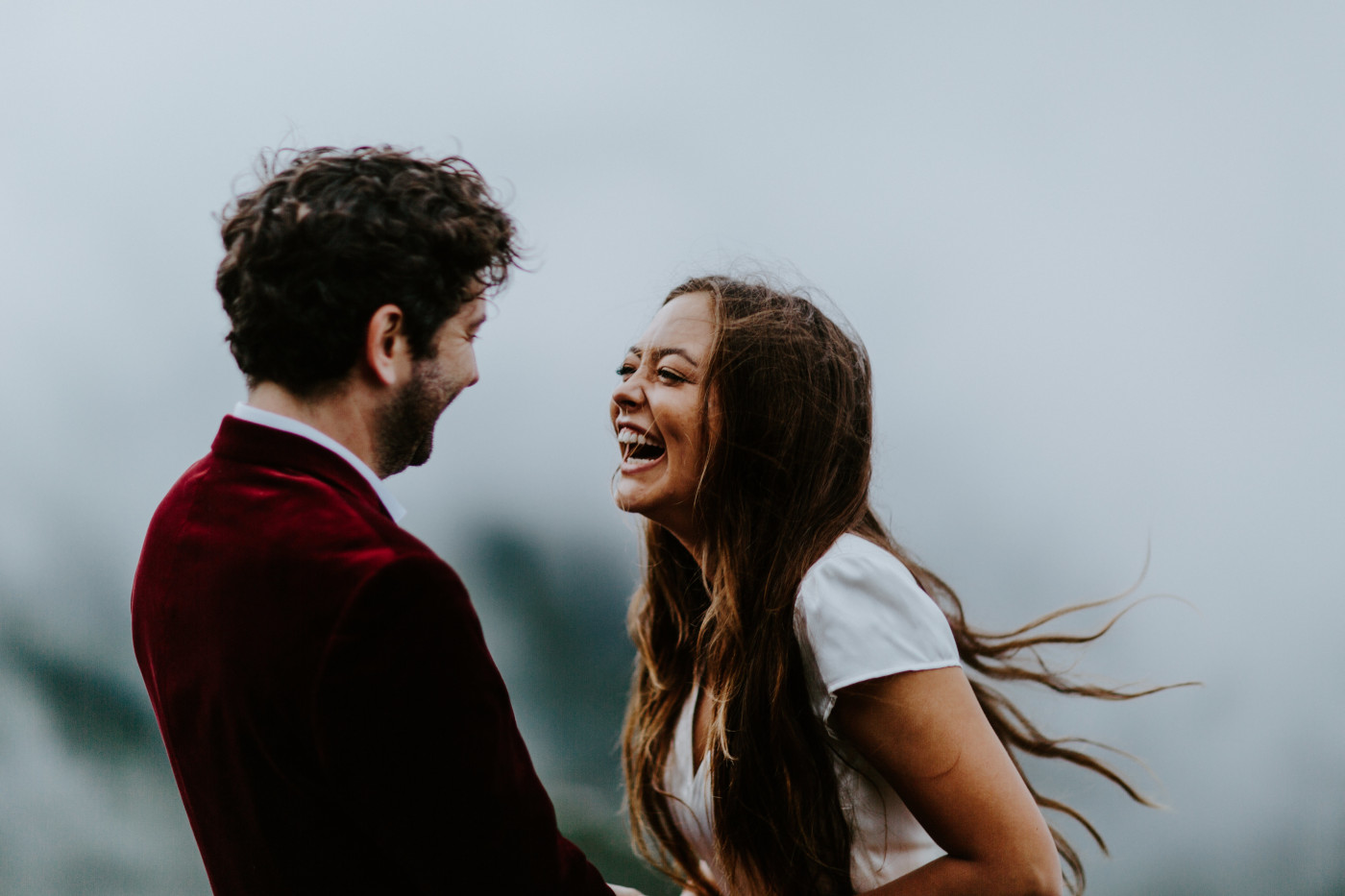 Murray and Katelyn laugh. Elopement wedding photography at Mount Hood by Sienna Plus Josh.