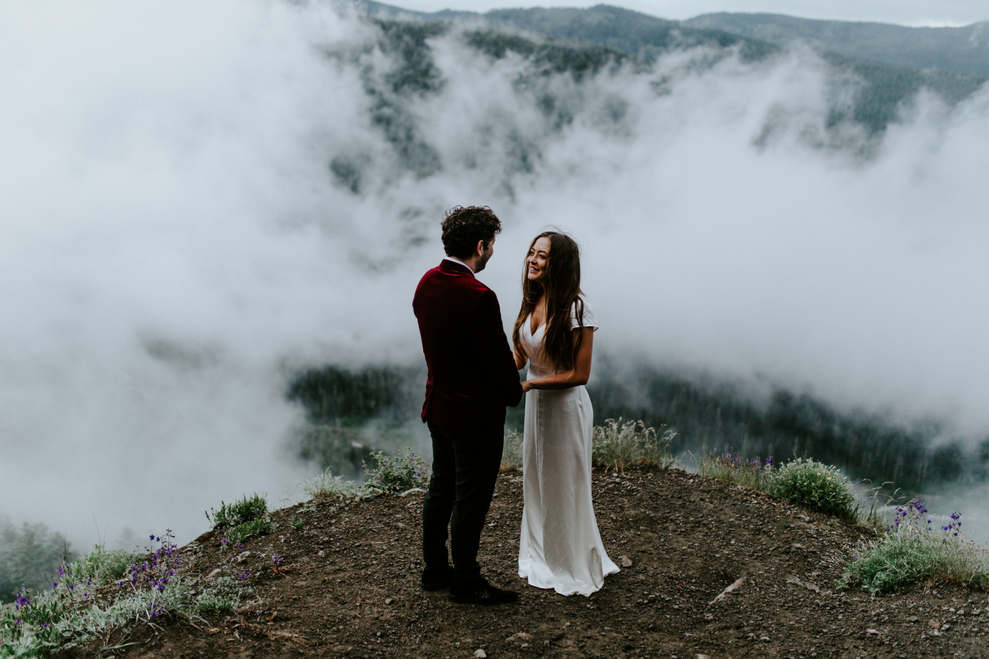 Murray and Katelyn along a cliff. Elopement wedding photography at Mount Hood by Sienna Plus Josh.