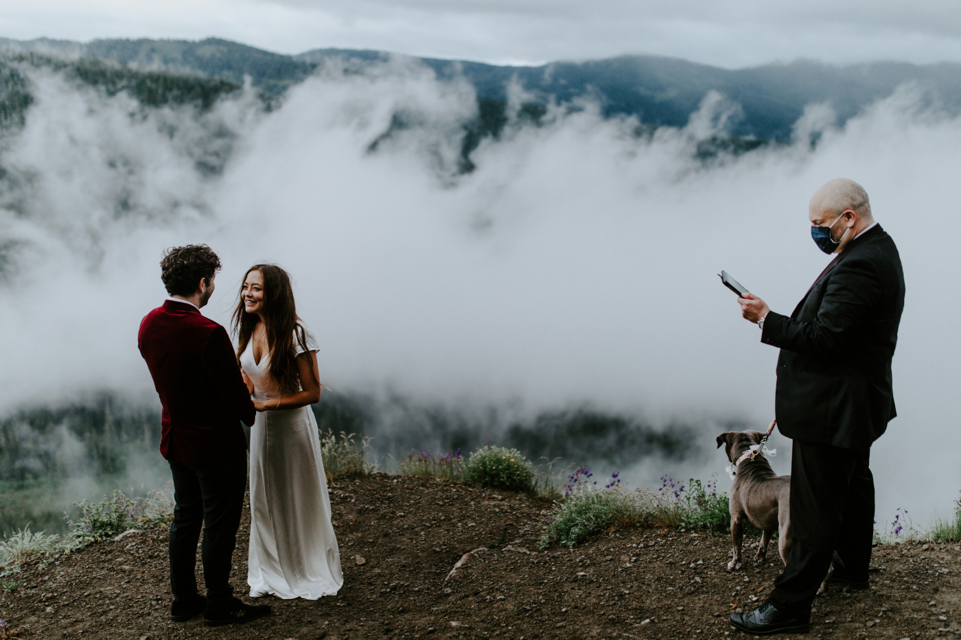 Murray and Katelyn during their ceremony as their officiant reads to them. Elopement wedding photography at Mount Hood by Sienna Plus Josh.