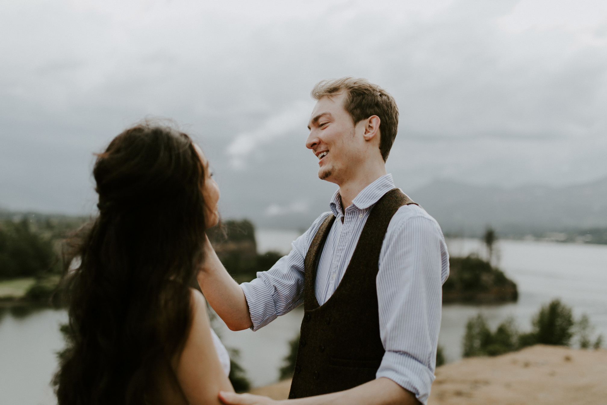 Jacob smiles at Kimberlie. Elopement wedding photography at Cascade Locks by Sienna Plus Josh.