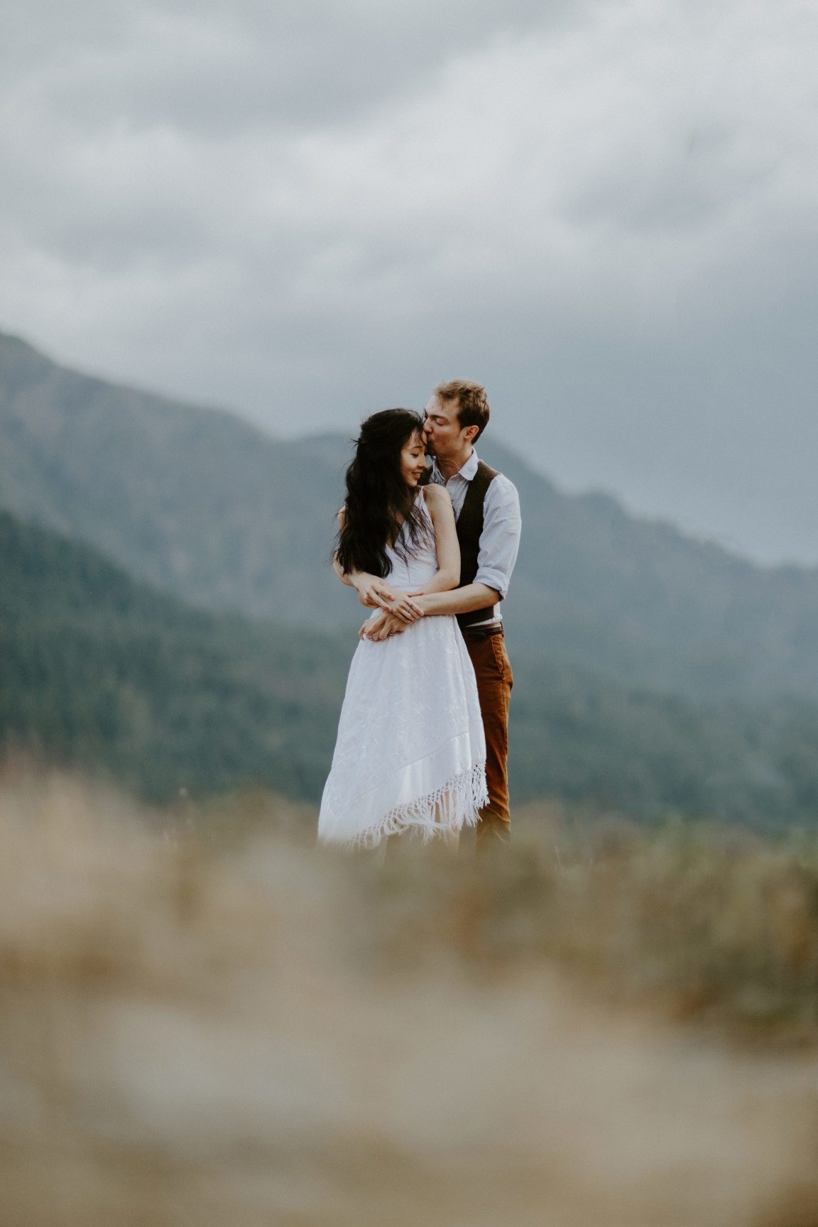 Kimberlie and Jacob share a moment at Cascade Locks. Elopement wedding photography at Cascade Locks by Sienna Plus Josh.