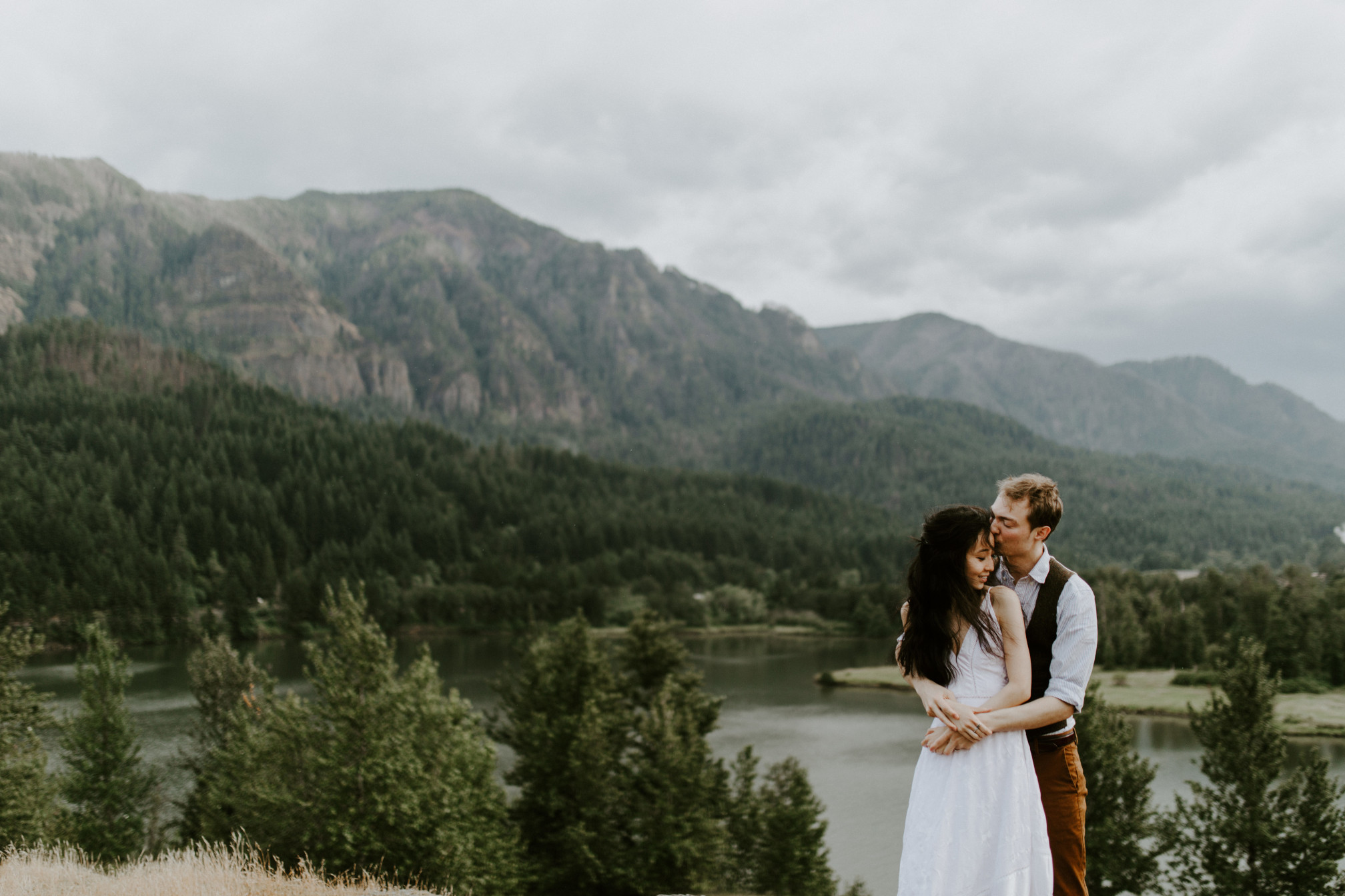 Kimberlie and Jacob stand together at Cascade Locks. Elopement wedding photography at Cascade Locks by Sienna Plus Josh.