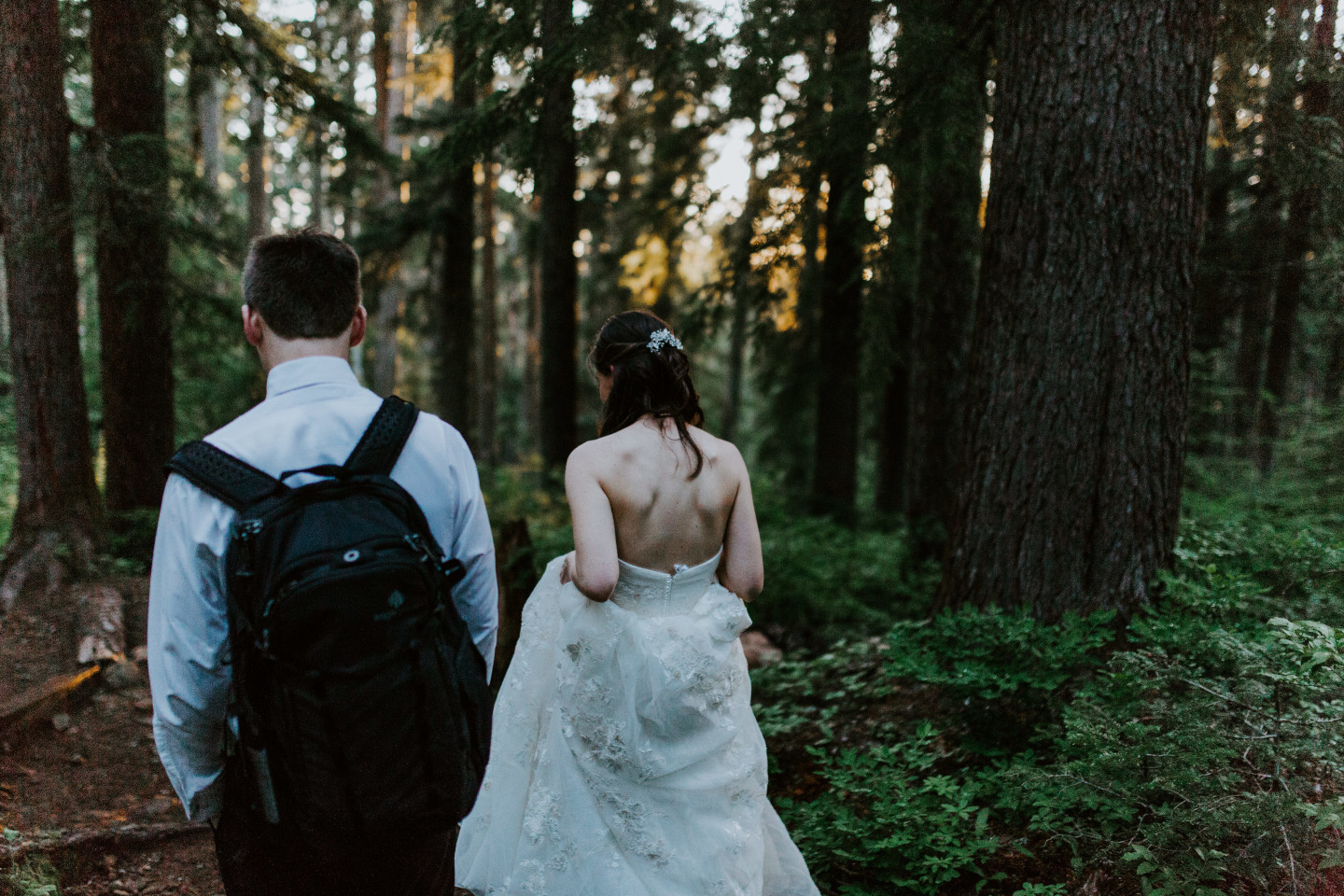 Moira and Ryan adventuring through the woods. Adventure elopement wedding shoot by Sienna Plus Josh.
