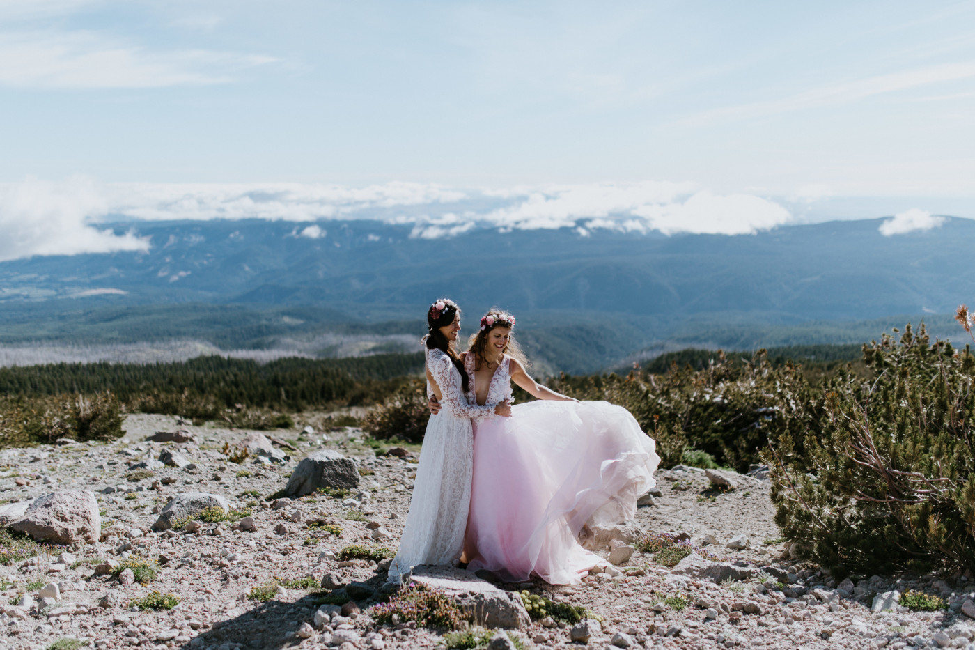Heather and Margaux standing with the view from Mount Hood. Elopement photography at Mount Hood by Sienna Plus Josh.