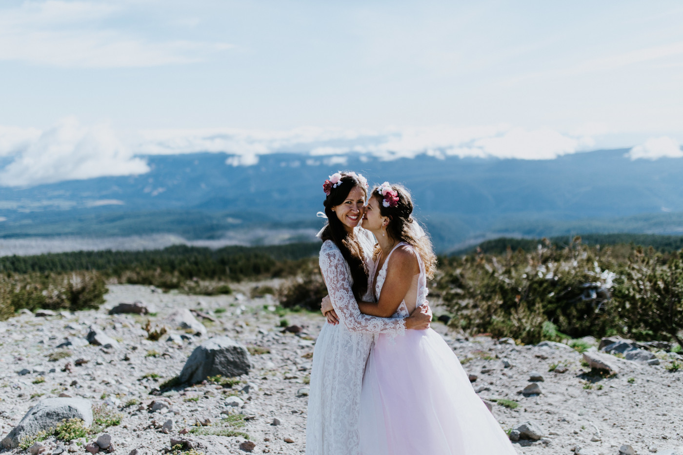 Margaux and Heather hold each other. Elopement photography at Mount Hood by Sienna Plus Josh.
