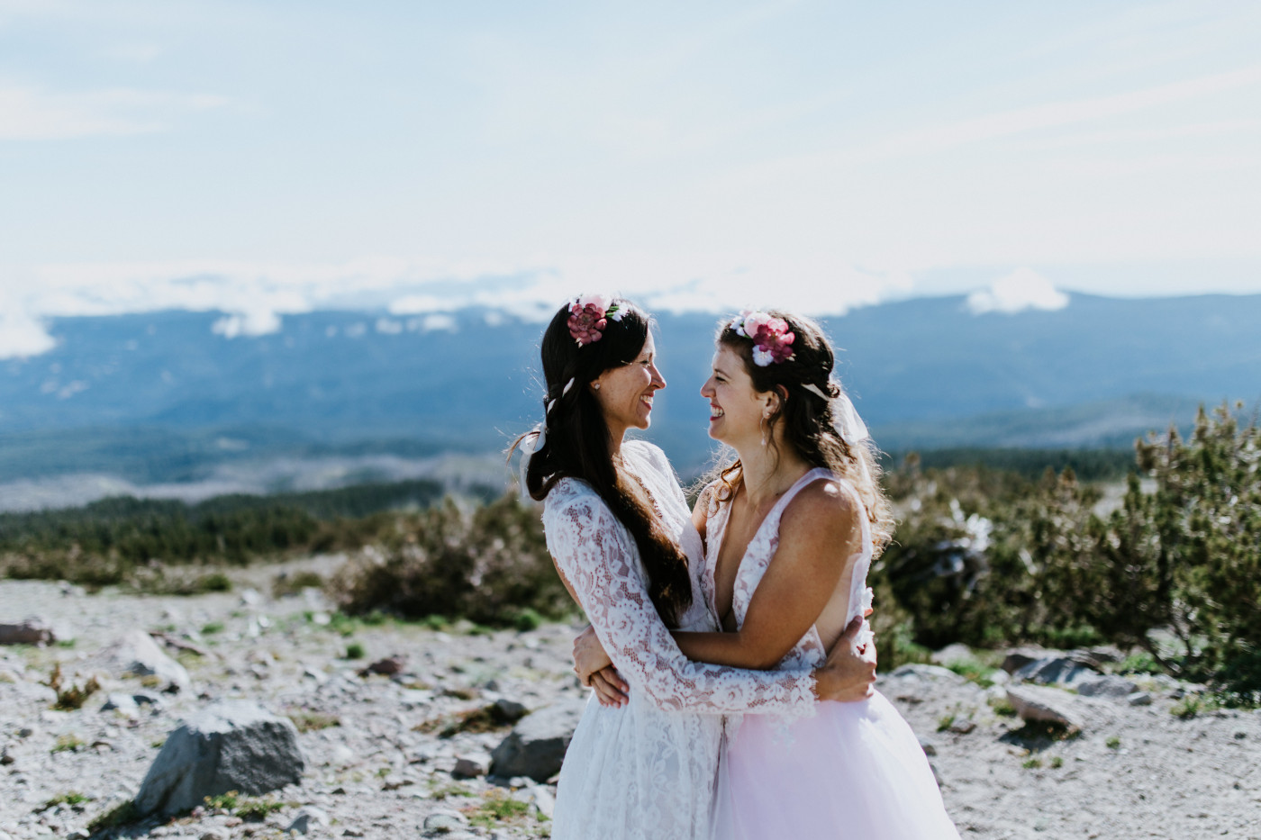 Heather and Margaux smile at each other. Elopement photography at Mount Hood by Sienna Plus Josh.
