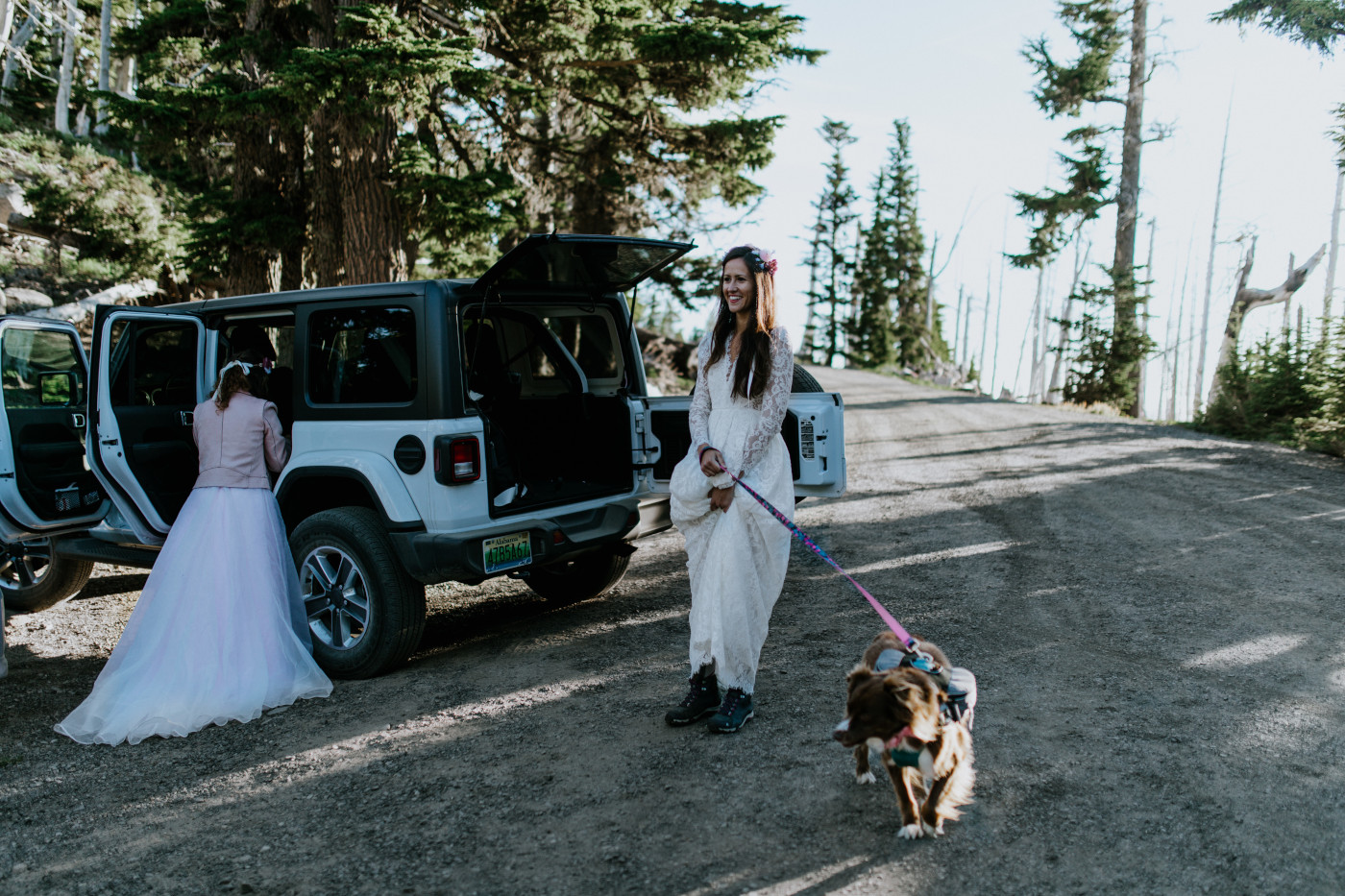 Margaux holds onto Piper while waiting for Heather. Elopement photography at Mount Hood by Sienna Plus Josh.