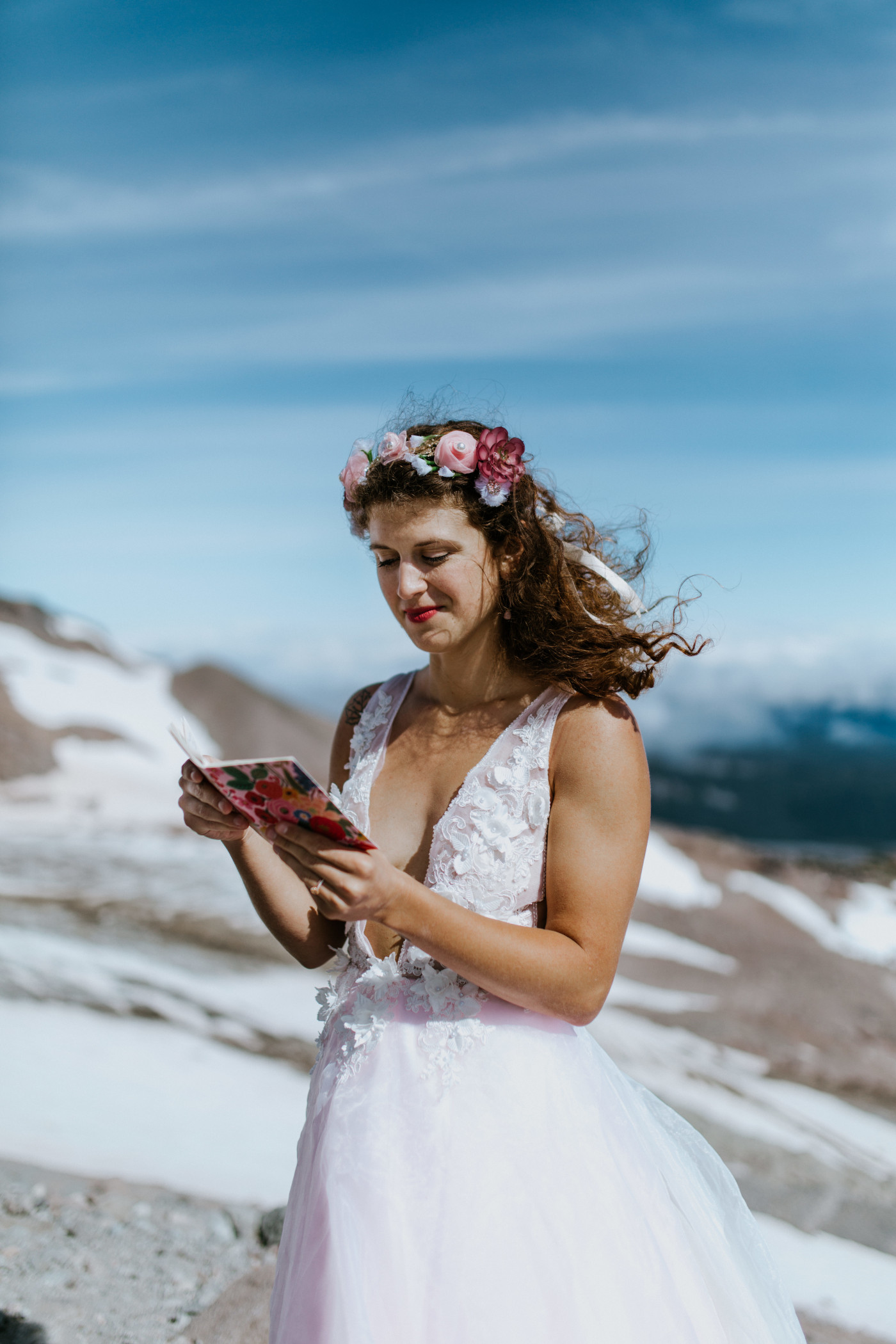 Heather reads from her vow book. Elopement photography at Mount Hood by Sienna Plus Josh.