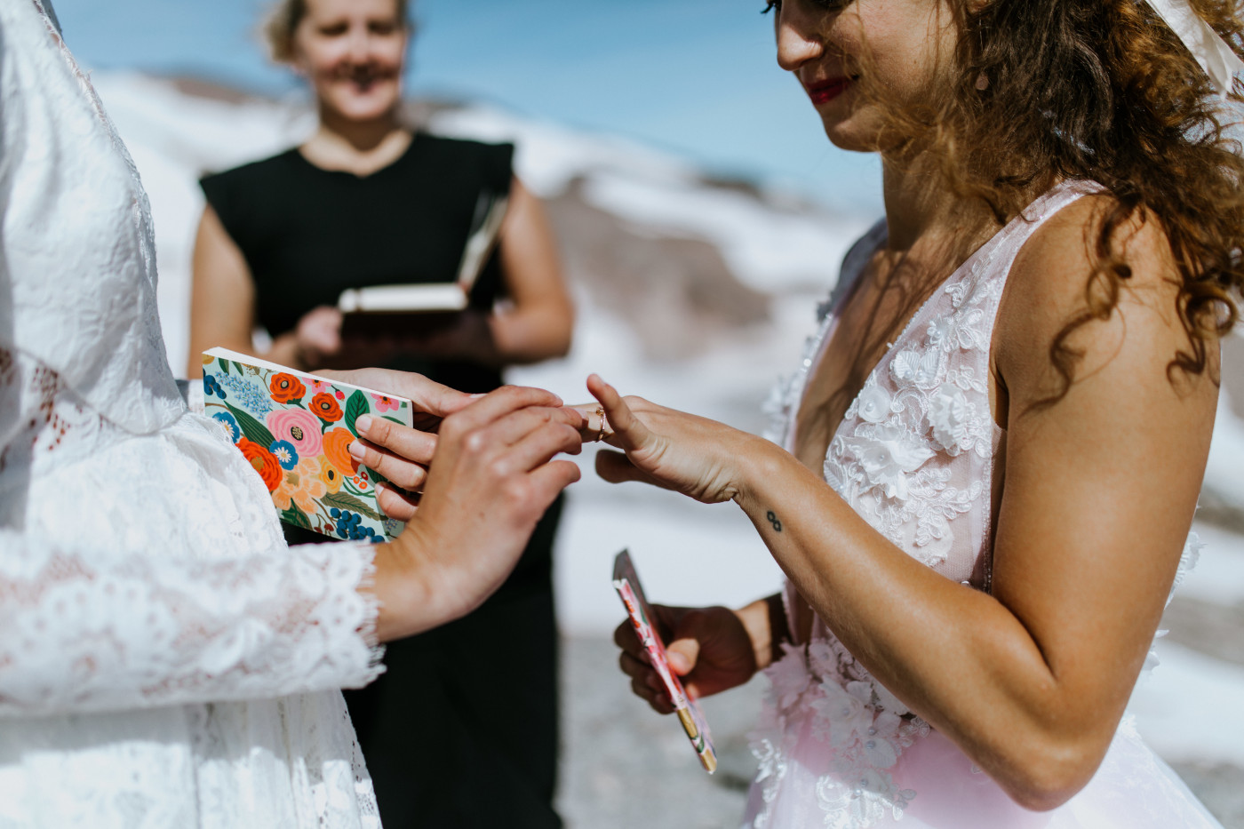 Margaux puts a ring on Heather. Elopement photography at Mount Hood by Sienna Plus Josh.