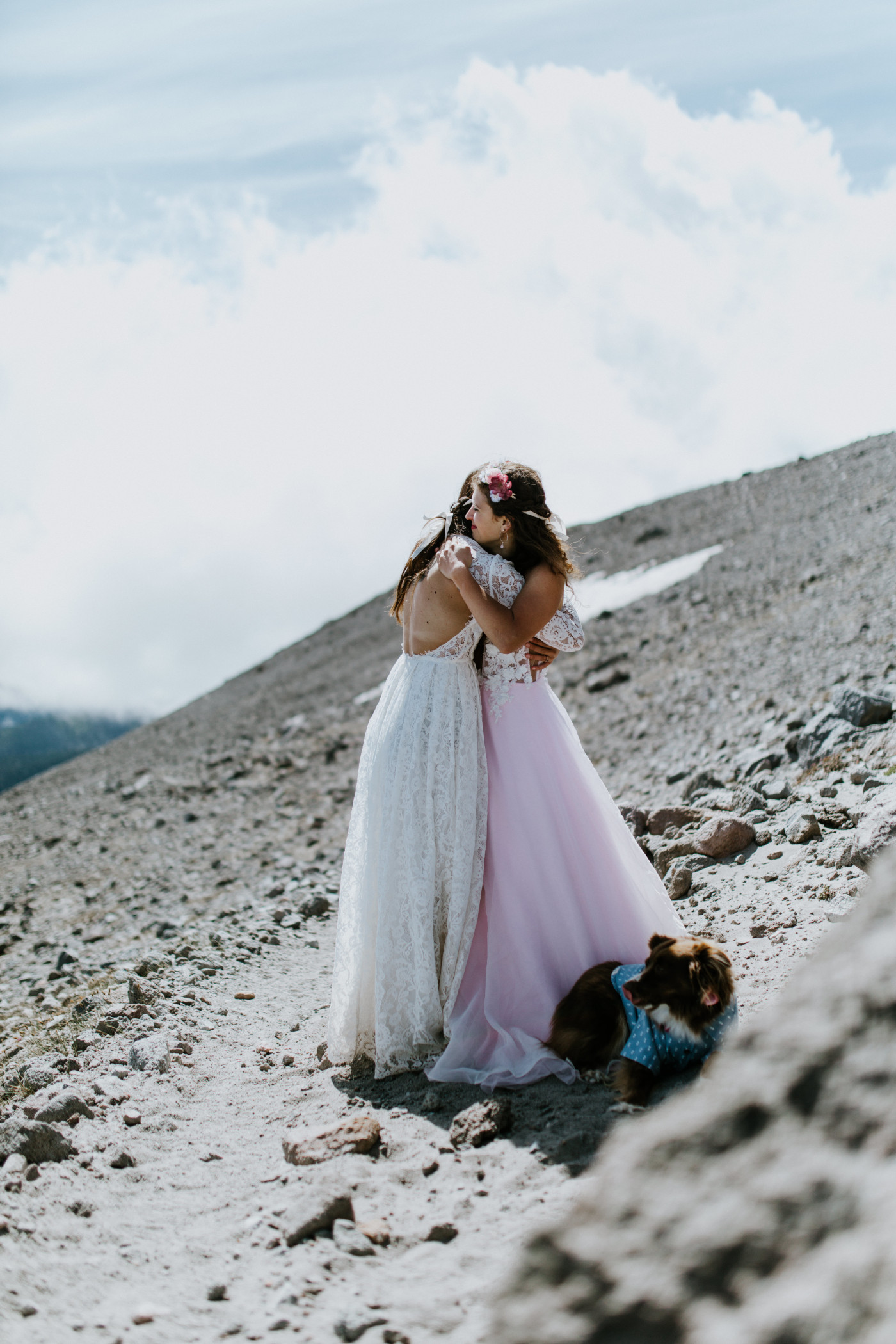 Margaux and Heather hug as they dance. Elopement photography at Mount Hood by Sienna Plus Josh.