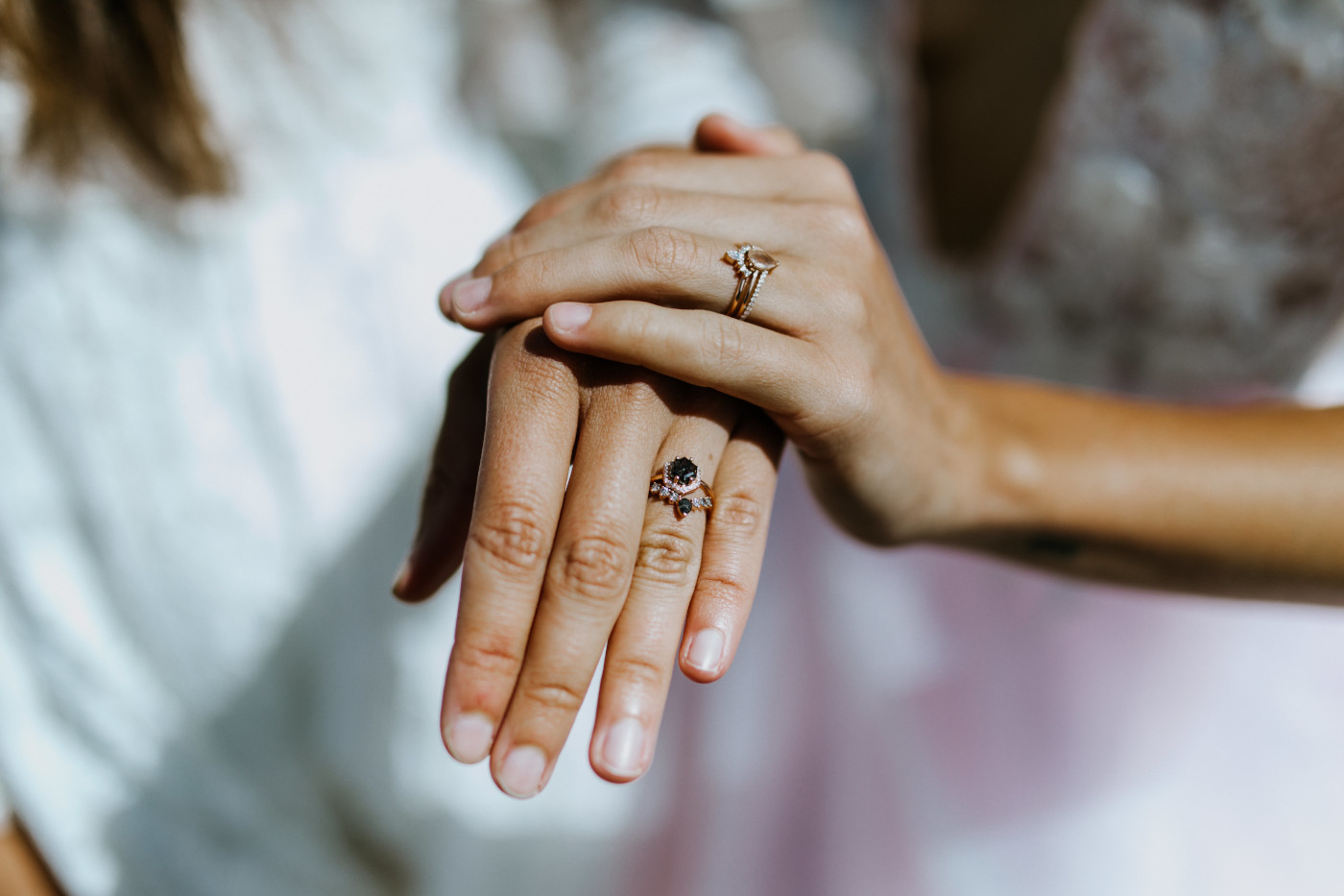 Margaux and Heather show their rings. Elopement photography at Mount Hood by Sienna Plus Josh.