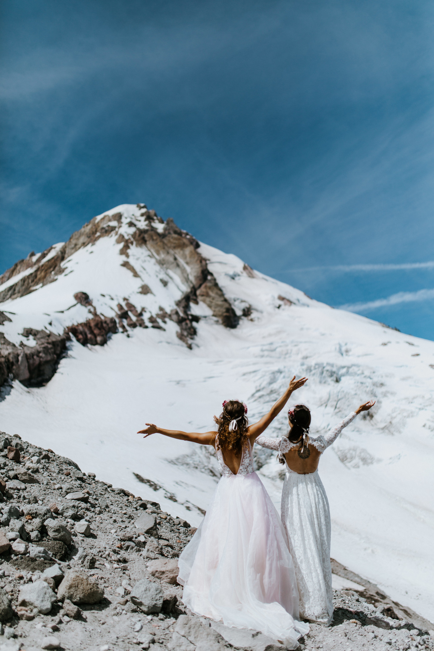 Margaux and Heather celebrate in front of Mount Hood. Elopement photography at Mount Hood by Sienna Plus Josh.