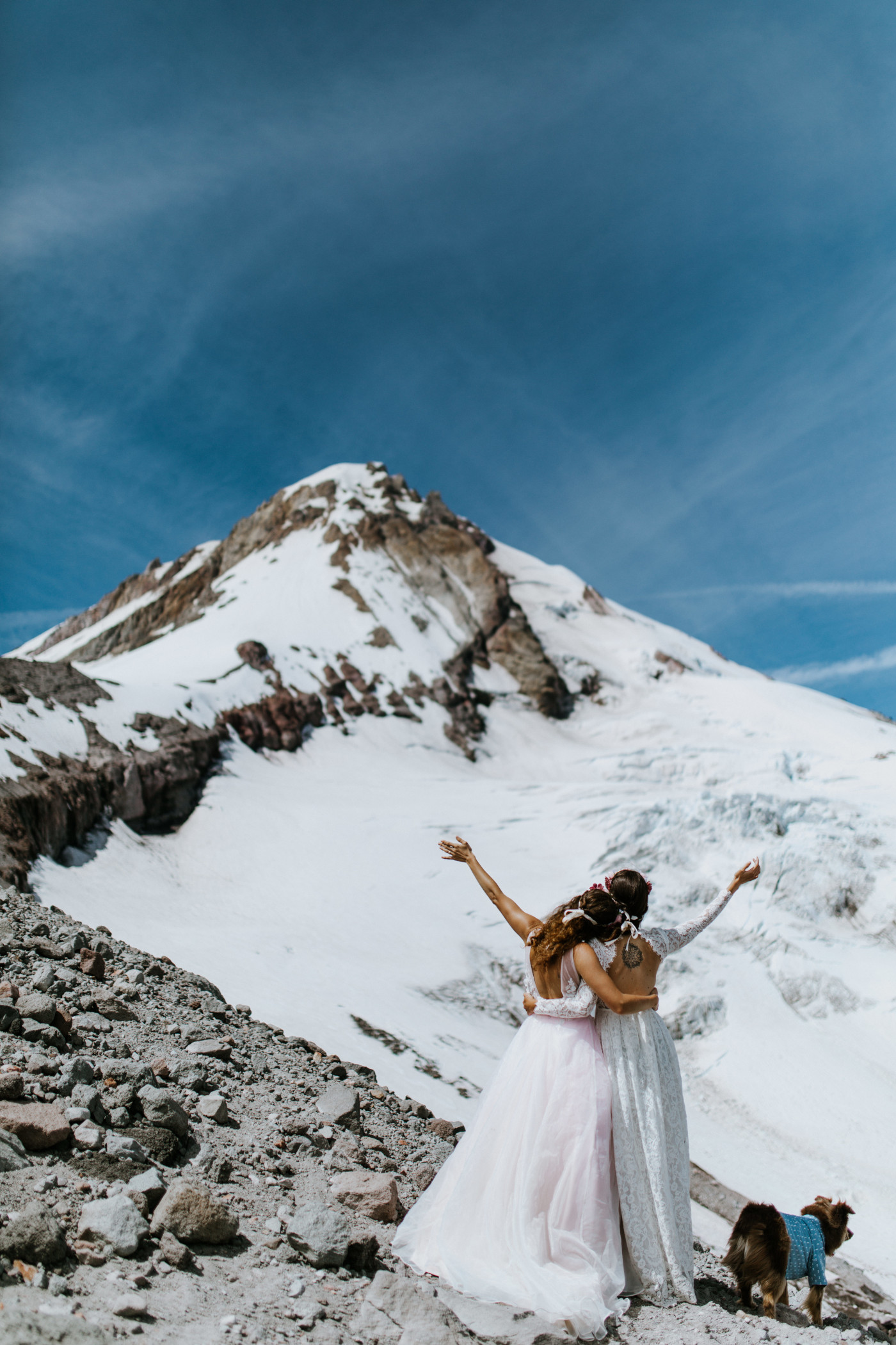 Margaux and Heather hug and celebrate. Elopement photography at Mount Hood by Sienna Plus Josh.