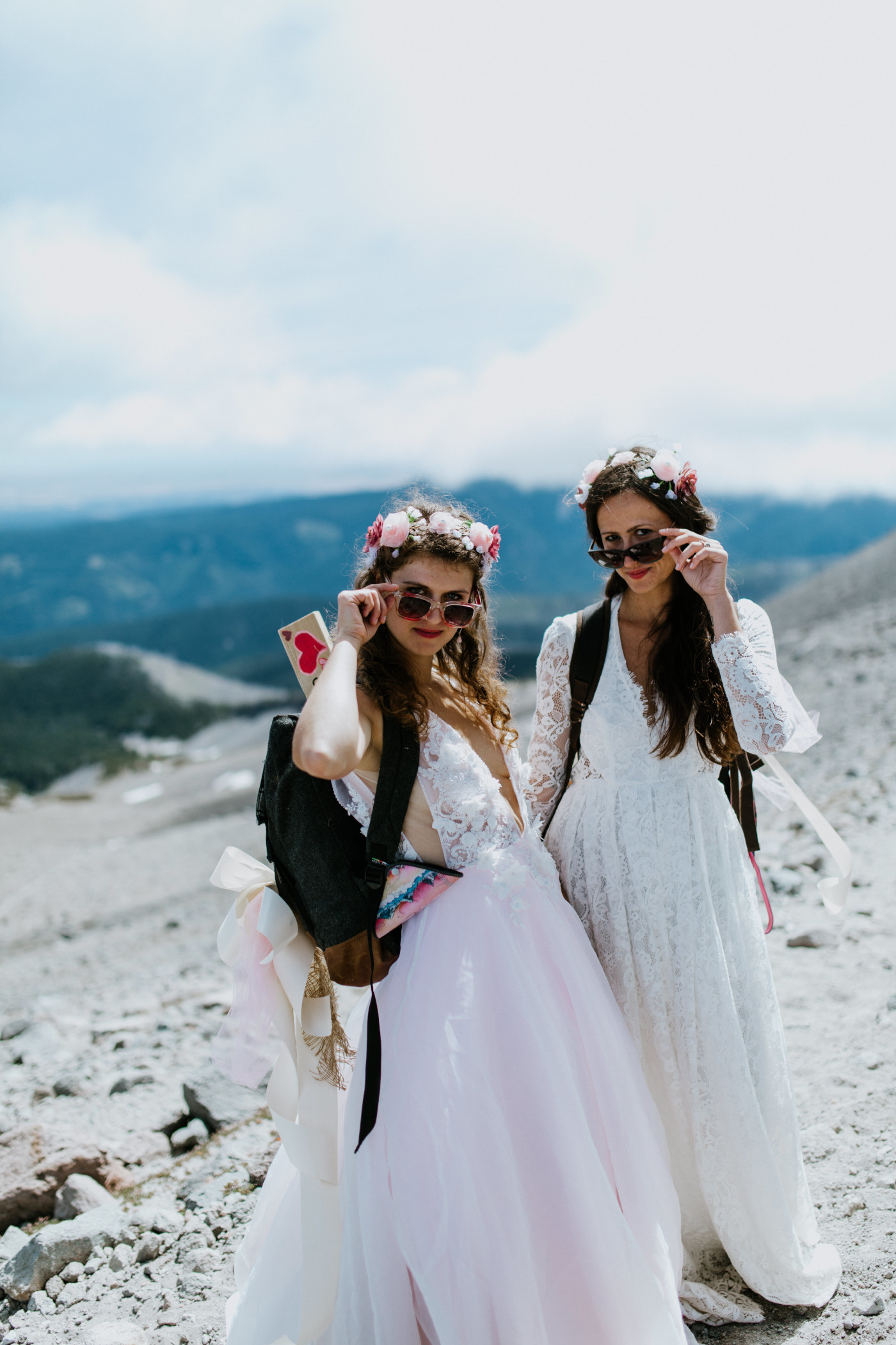 Margaux and Heather put on their sunglasses for the hike down. Elopement photography at Mount Hood by Sienna Plus Josh.