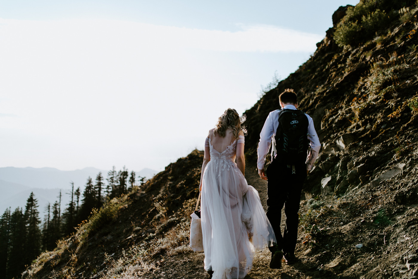 Corey and Kylie walk near a cliff in the Mount Hood National Forest.