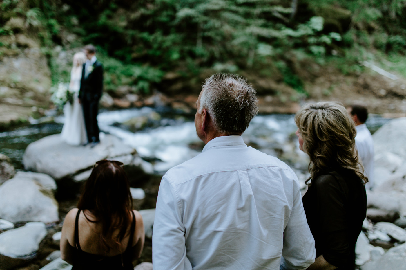 The parents look on at the elopement ceremony.