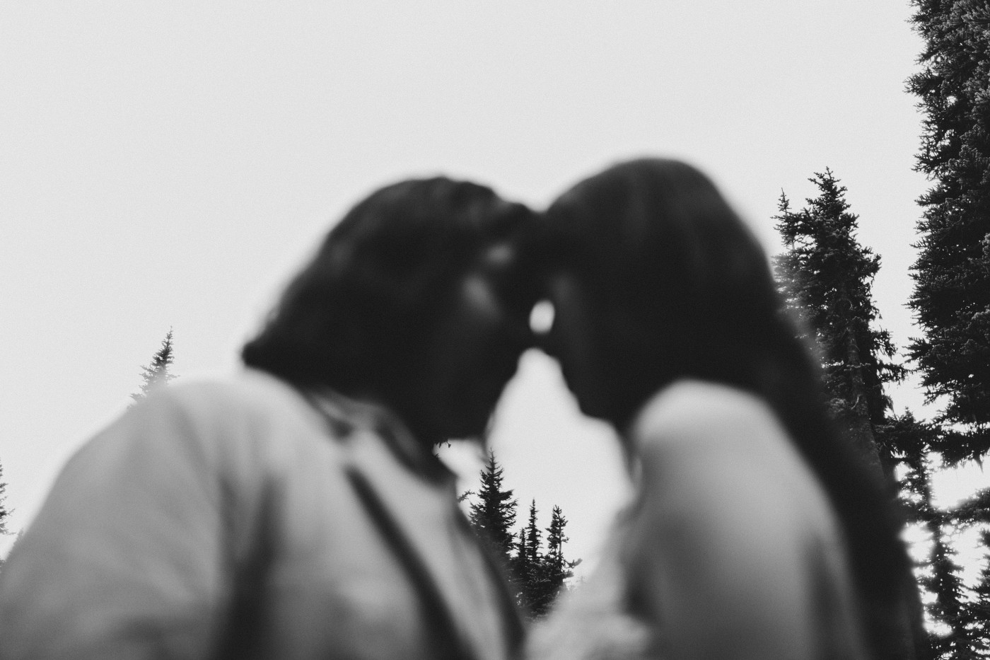 Matthew and Katrina stand head to head at Mount Rainier during their elopement.