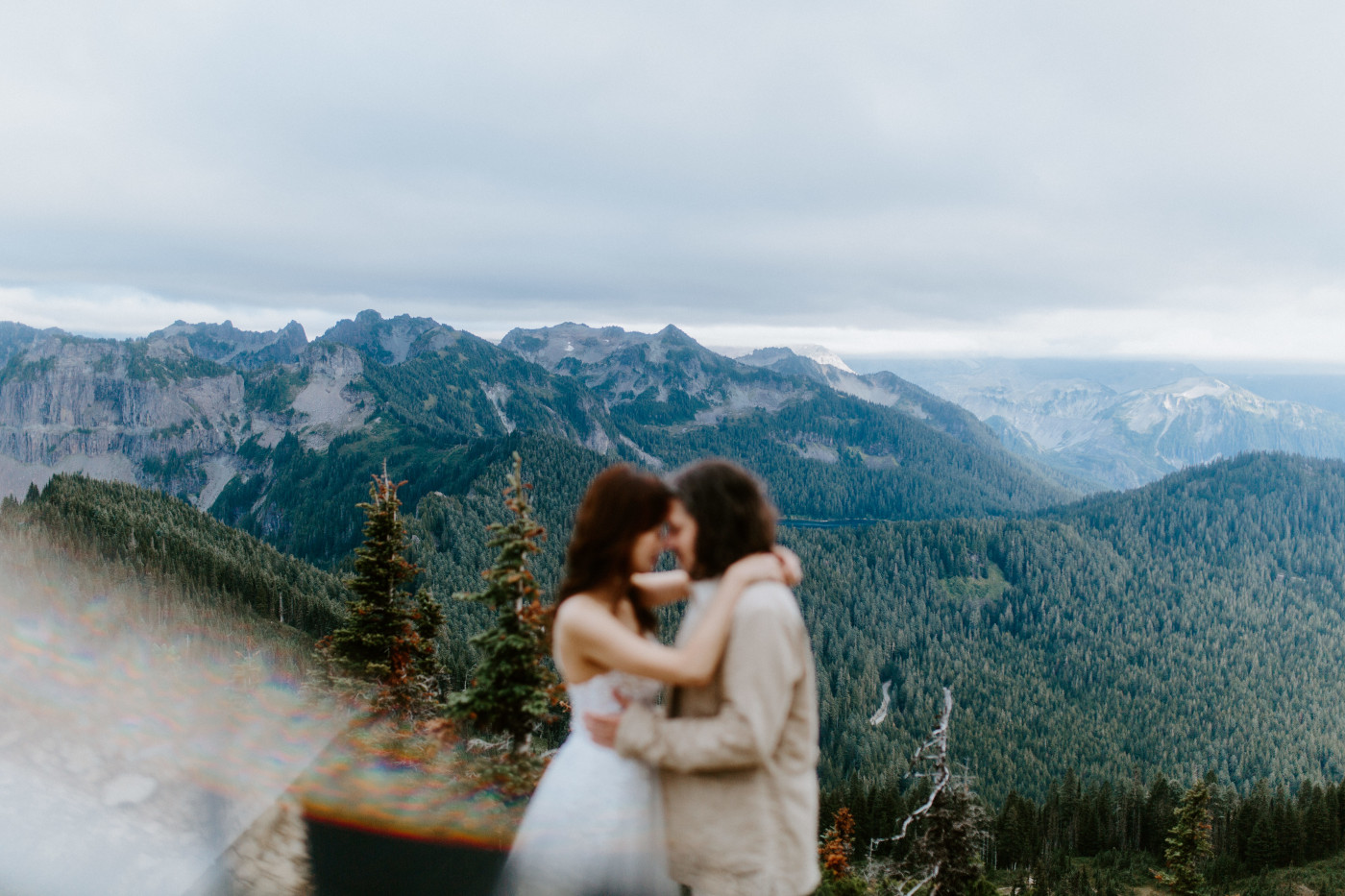 Matthew and Katrina stand head to head at Mount Rainier after their elopement.