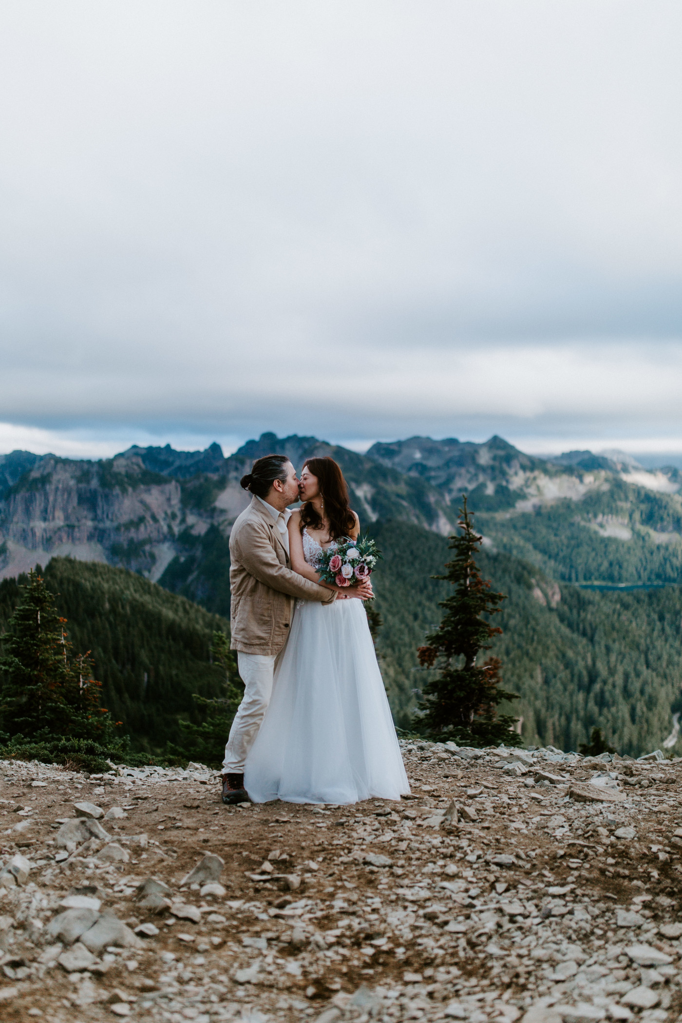 Matthew and Katrina kiss during their elopement at Mount Rainier, Washington.