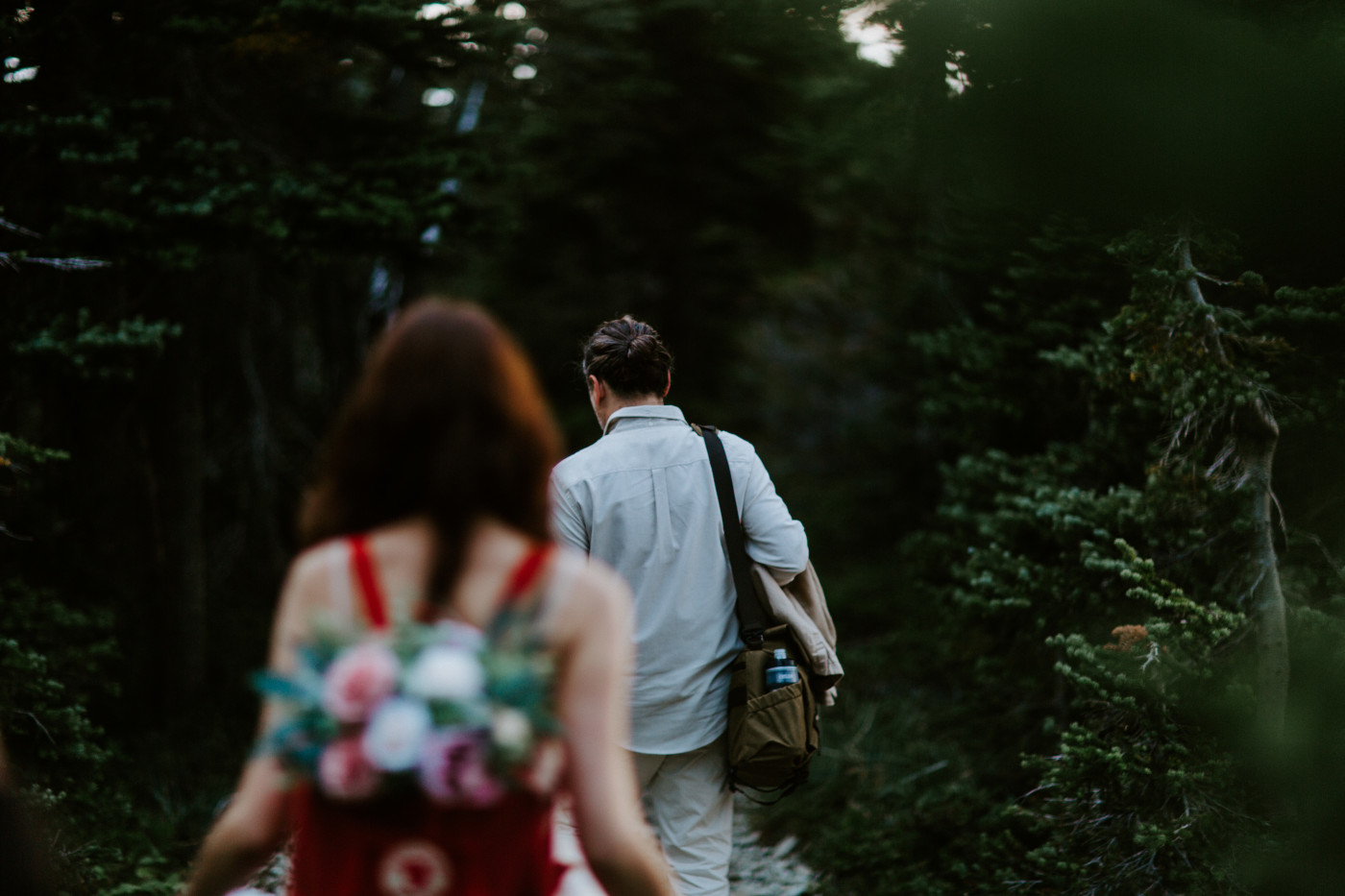 Matthew and Katrina walk down the hiking path at Mount Rainier, Washington.