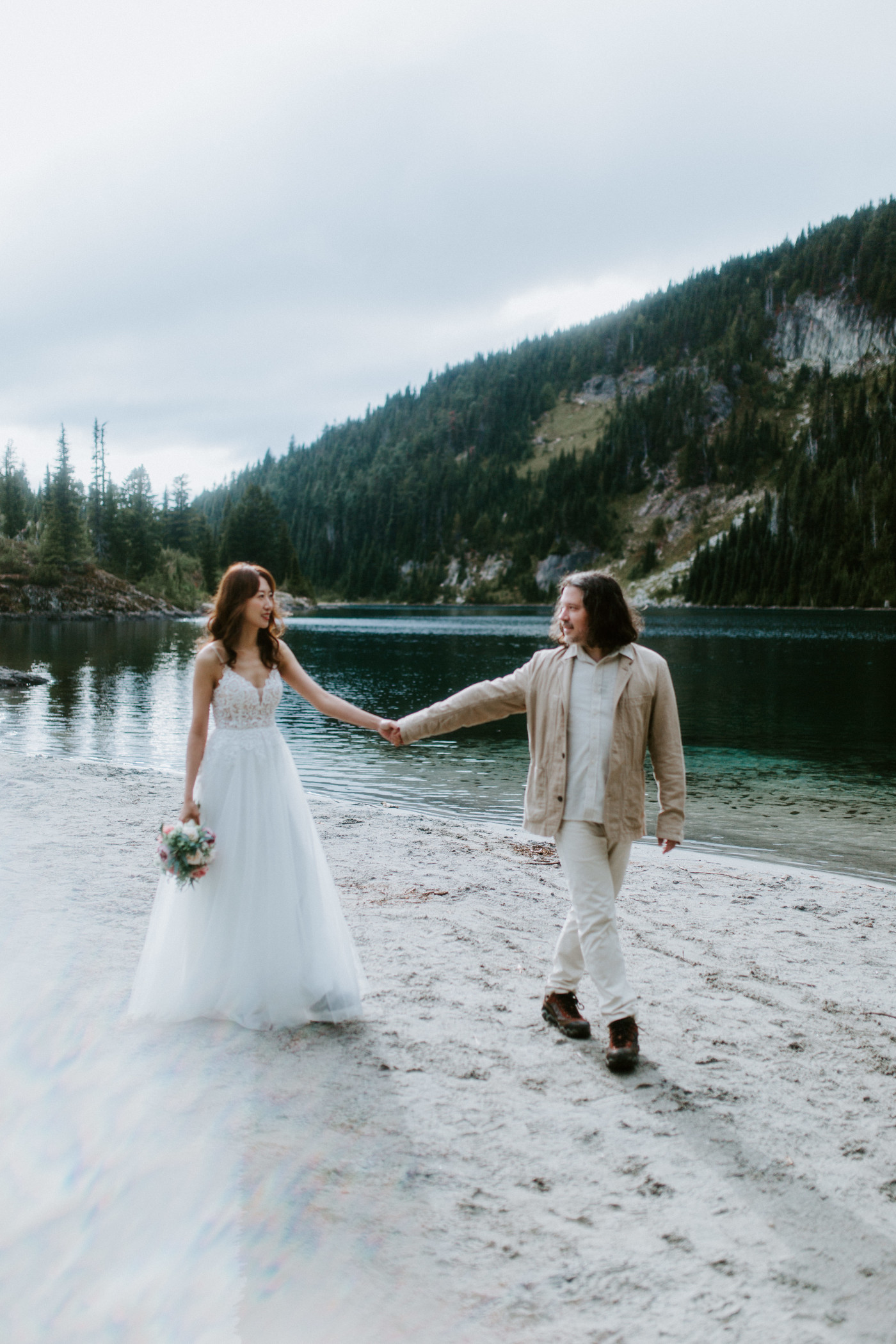 Katrina and Matthew walk along the path of Mount Rainier in Washington.