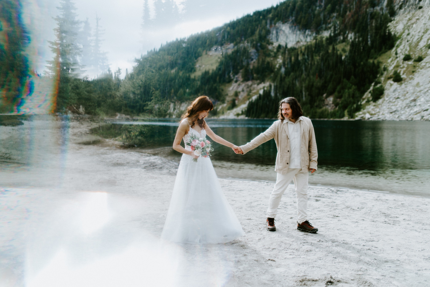 Katrina and Matthew walk hand in hand at Mount Rainier.