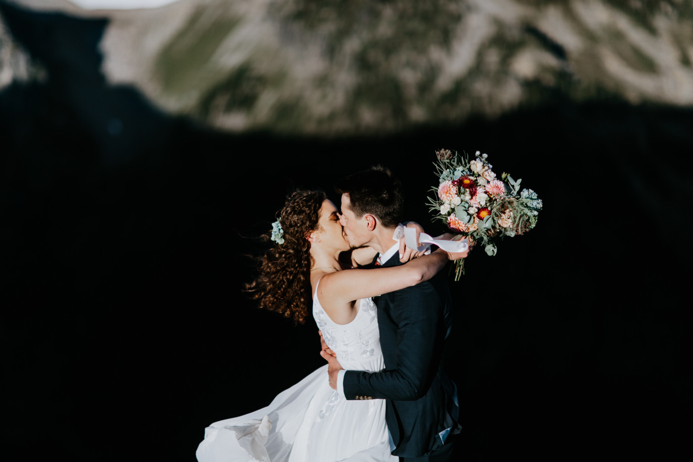 Tasha and Chad kiss. Elopement photography at Mount Rainier by Sienna Plus Josh.
