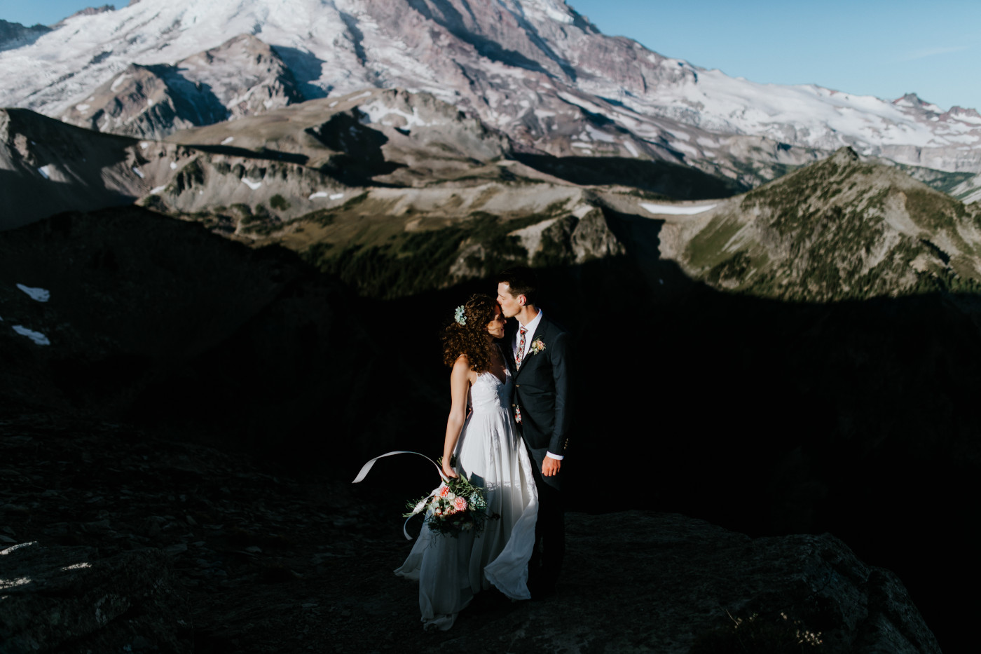 Tasha and Chad stand at their elopement place. Elopement photography at Mount Rainier by Sienna Plus Josh.
