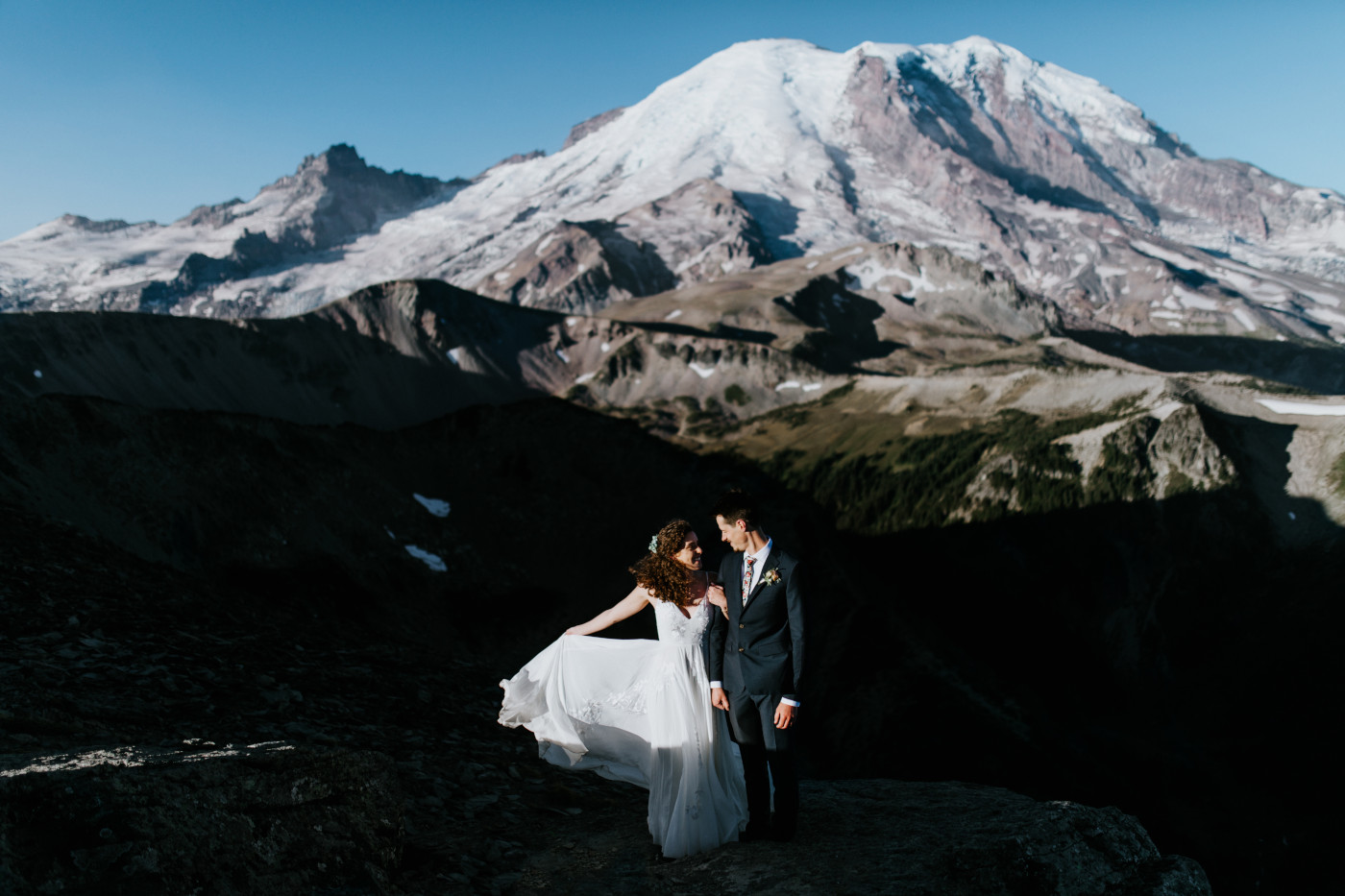 Tasha and Chad stand together. Elopement photography at Mount Rainier by Sienna Plus Josh.
