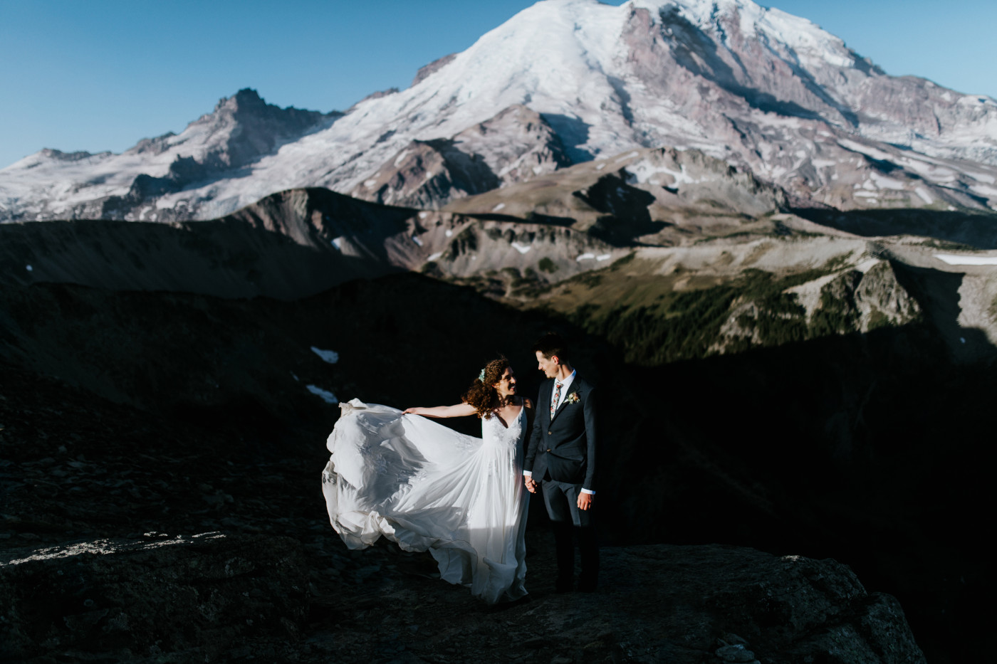 Tasha shows off her dress. Elopement photography at Mount Rainier by Sienna Plus Josh.
