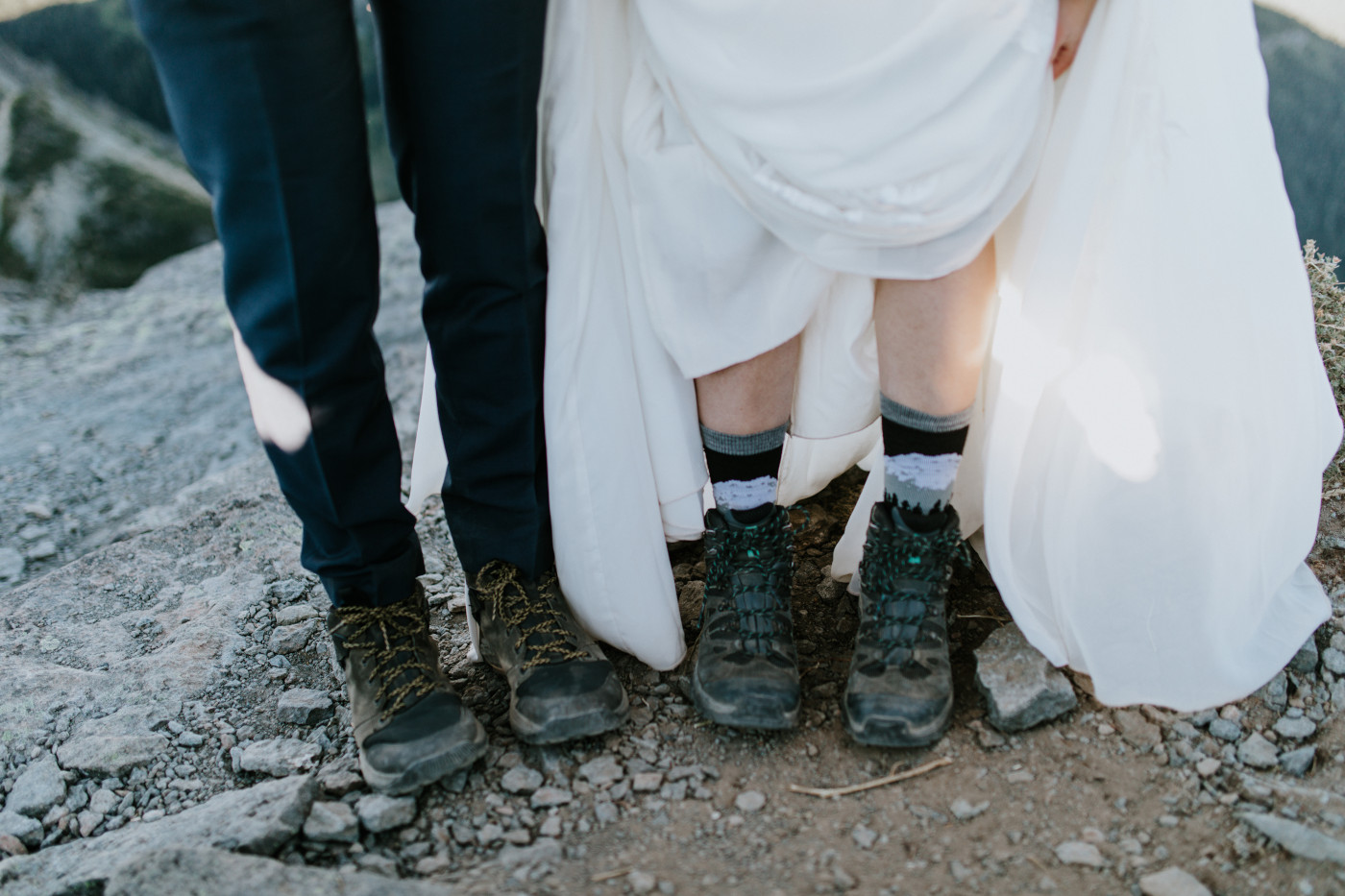 Chad and Tasha show off their shoes. Elopement photography at Mount Rainier by Sienna Plus Josh.