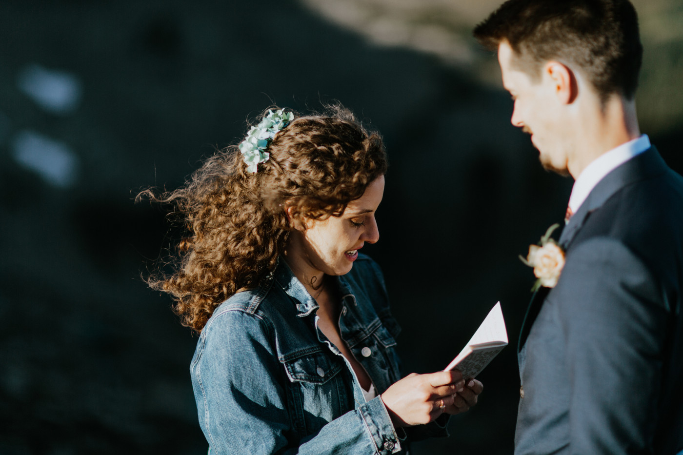 Tasha reads her vows to Chad. Elopement photography at Mount Rainier by Sienna Plus Josh.