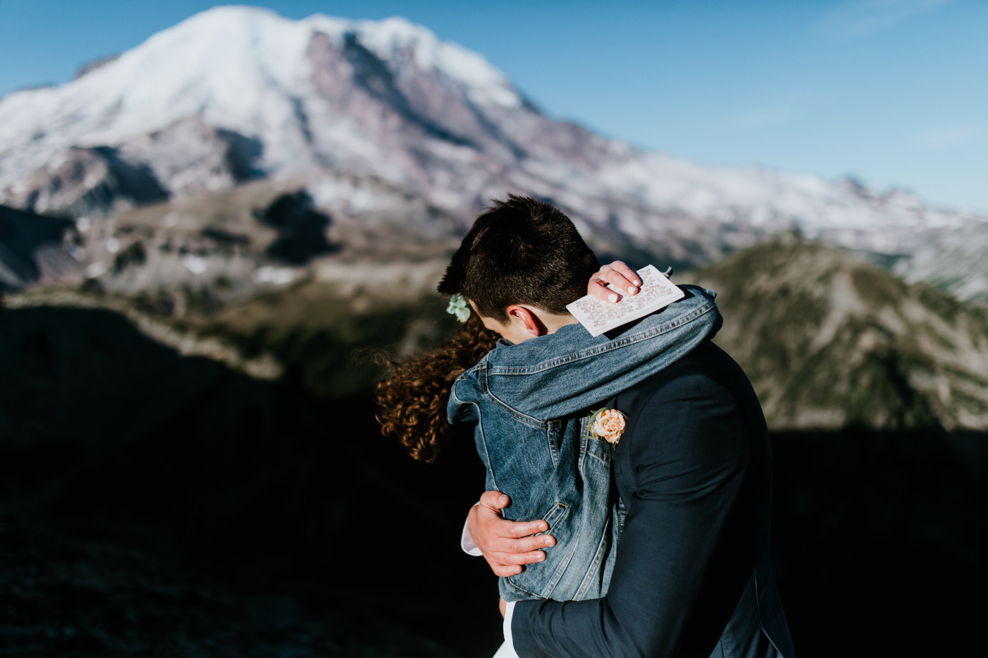 Tasha and Chad hugging. Elopement photography at Mount Rainier by Sienna Plus Josh.